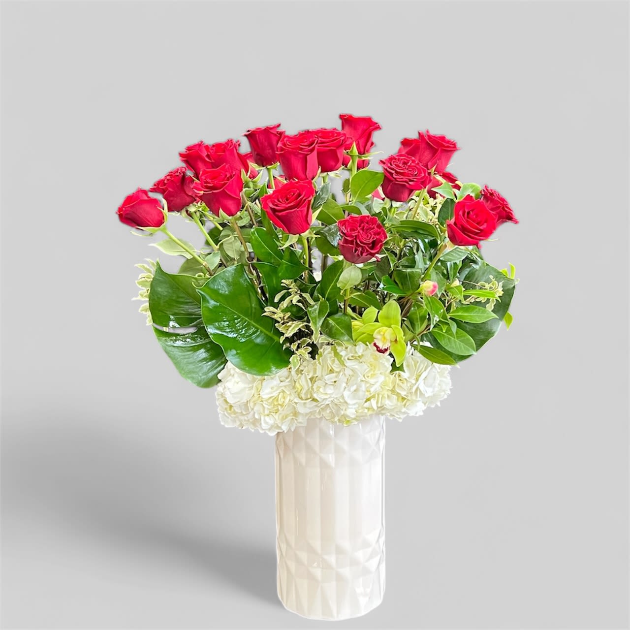 Vintage Dozen - Dozen Red Rose Arrangements with a modern vintage look with burnt orangecymbidium orchids. Green 