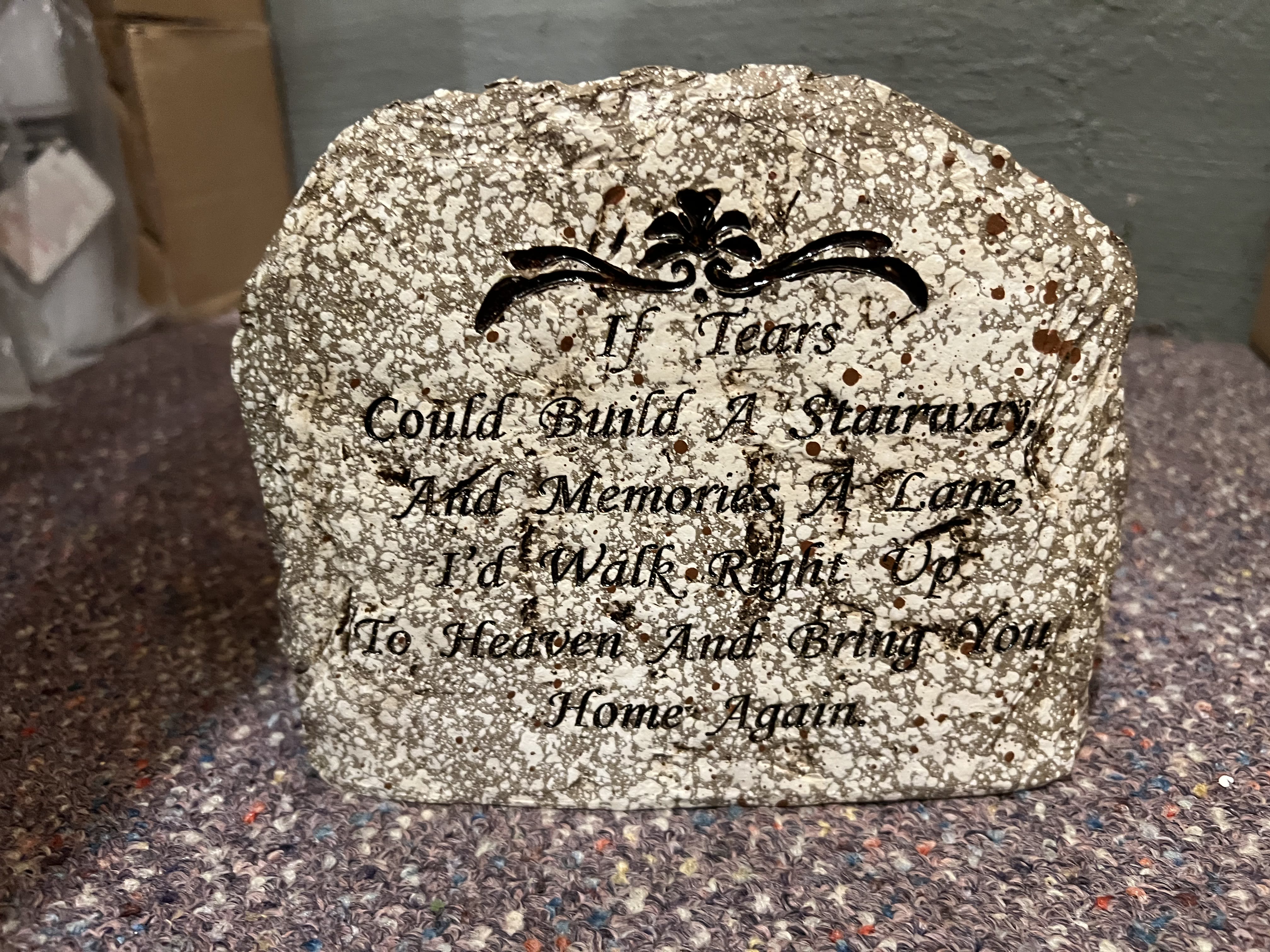 Memory Garden Stone - A memorial garden stone. Shown here with silk accents. (Not included) Free standing, upright. Our memorial garden stones are a lasting way to honor the memory of a loved one. Made to be weatherproof and guaranteed to last a lifetime, these stones are the perfect addition to any garden. Inscription reads: &quot;If tears could build a stairway and memories a lane, I'd walk right up to Heaven and Bring you Home again.&quot; Inventory count: 2 If you pick the deluxe or premium price point, we will add in a base, surrounded with fresh flowers and greenery.