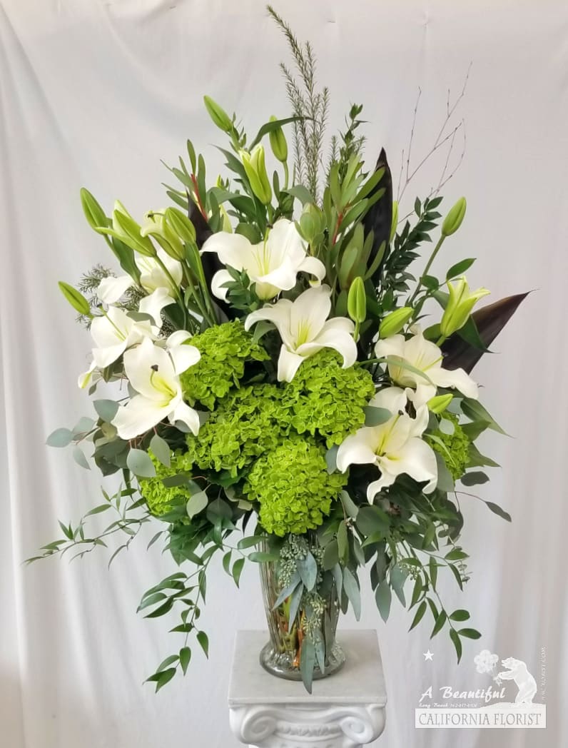 Naturally Elegant Naturally Elegant - A beautiful collection of premium blooms and foliage in shades of white and green - Naturally Elegant