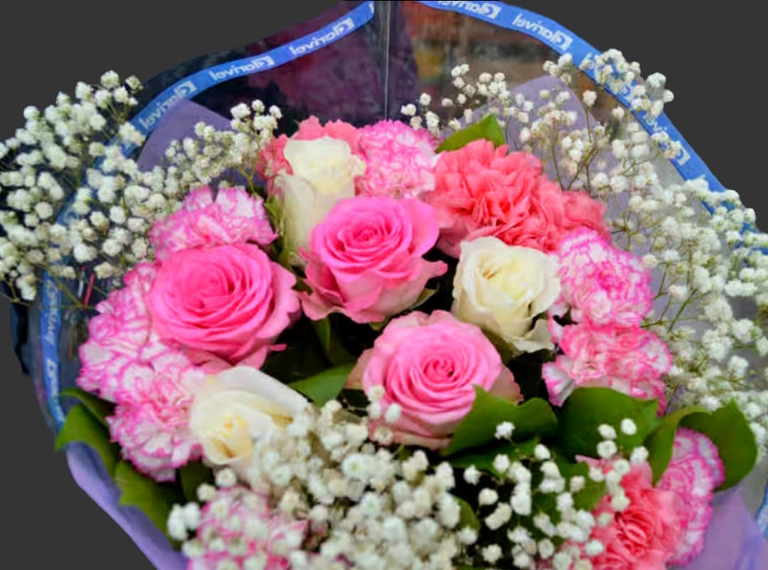 $80 NICE PINK AND WHITE BOUQUET $80 NICE PINK AND WHITE BOUQUET - Nice mix of pink and white roses, and pink and hot pink carnation flowers with bab'ys breath and greenery. Very sweet smelling and beautiful inexpensive floral gift for the one you love. ALSO COMES WITH A FREE VASE.