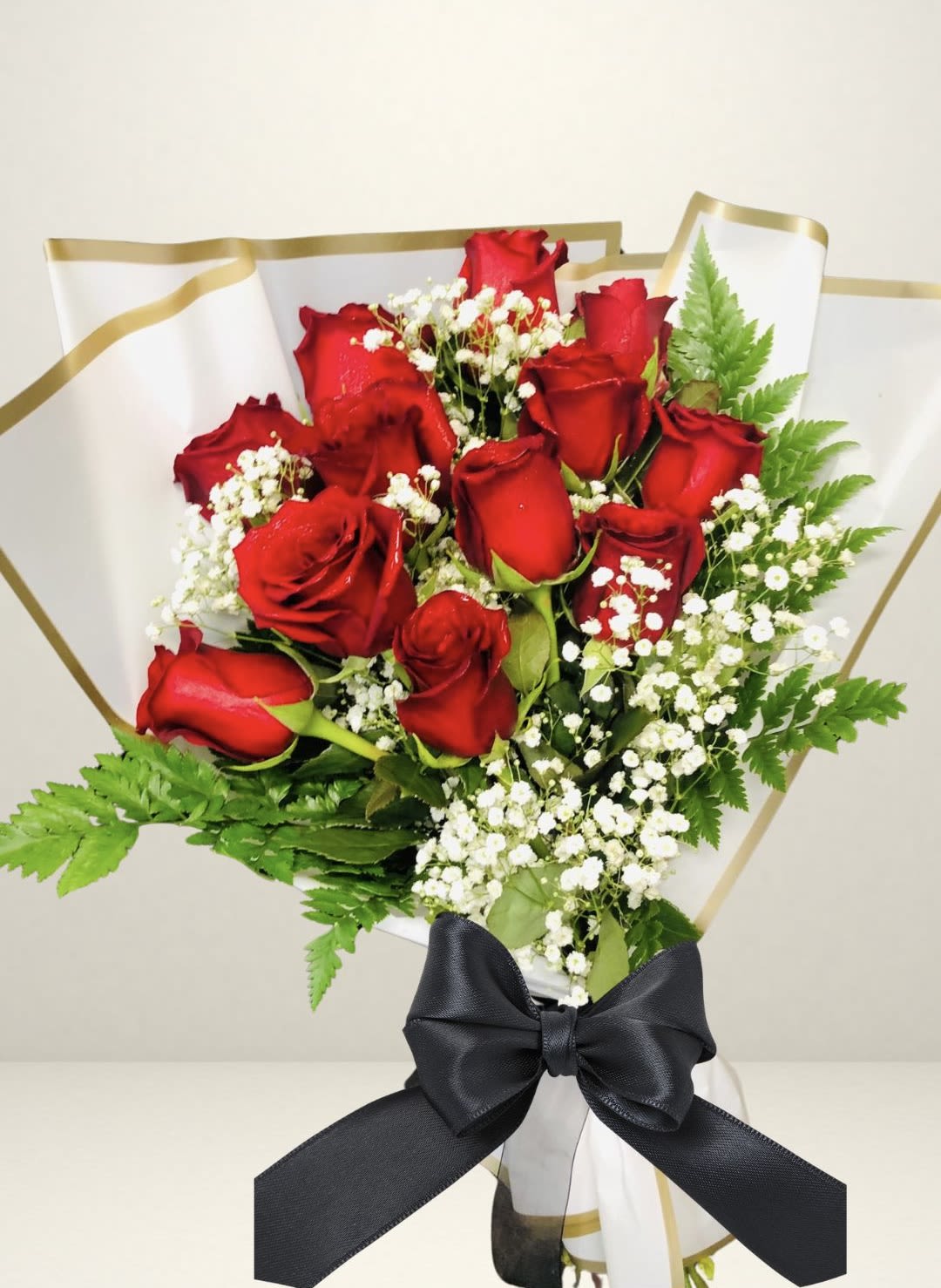 Elegant Essence Rose Bbouquet Elegant Essence Rose Bbouquet - 12 Beautiful Red Roses Arranged With Babys Breath And Greenery Hand-Tied Bouquet, Wrapped In Elegant Paper With Satin Ribbon. Perfect Gift For Any Special Occasion!
