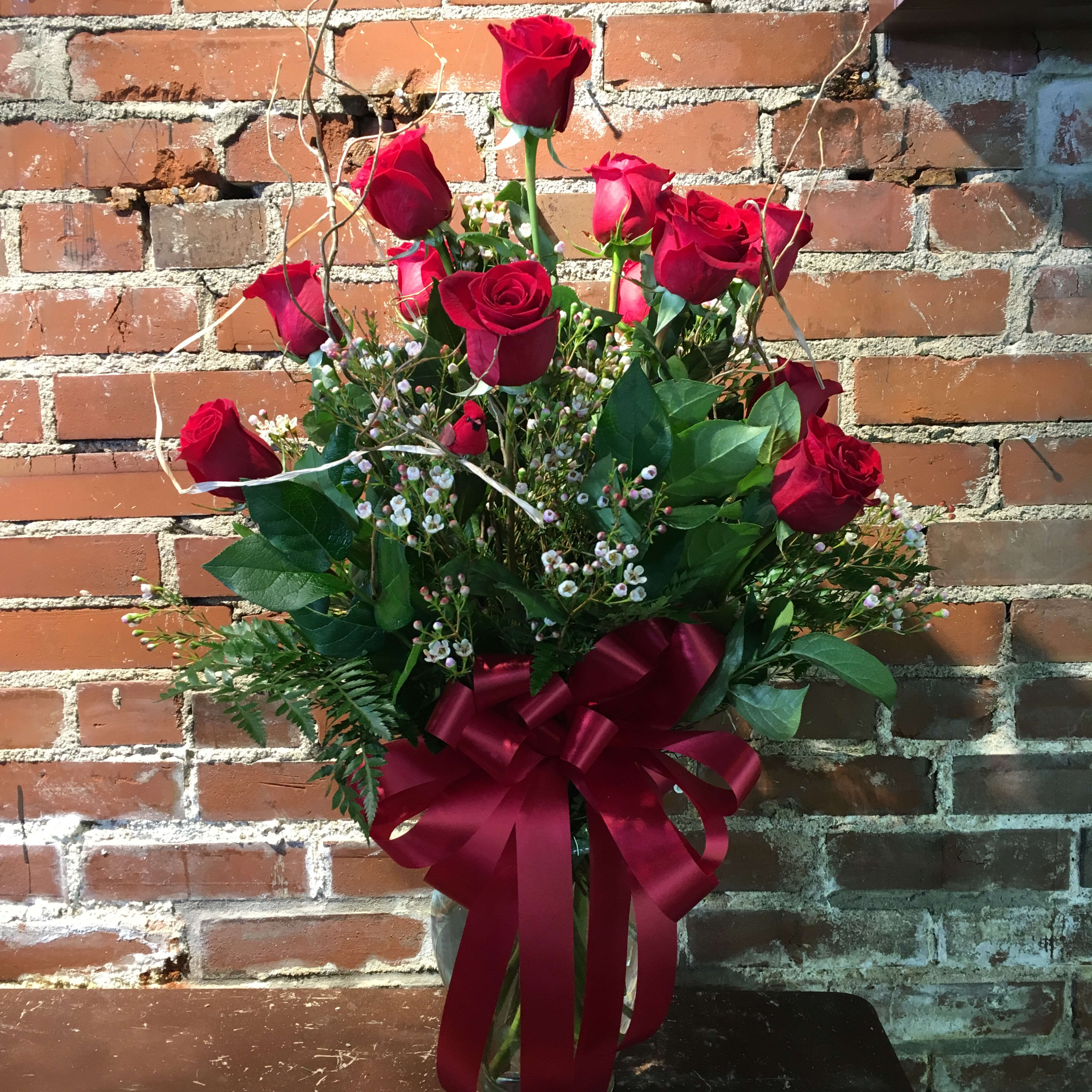 Eckert Florist's 1 Dozen Roses Eckert Florist's 1 Dozen Roses - One dozen of our finest Red Roses. CALL US TO SEE OTHER COLORS WE HAVE IN!