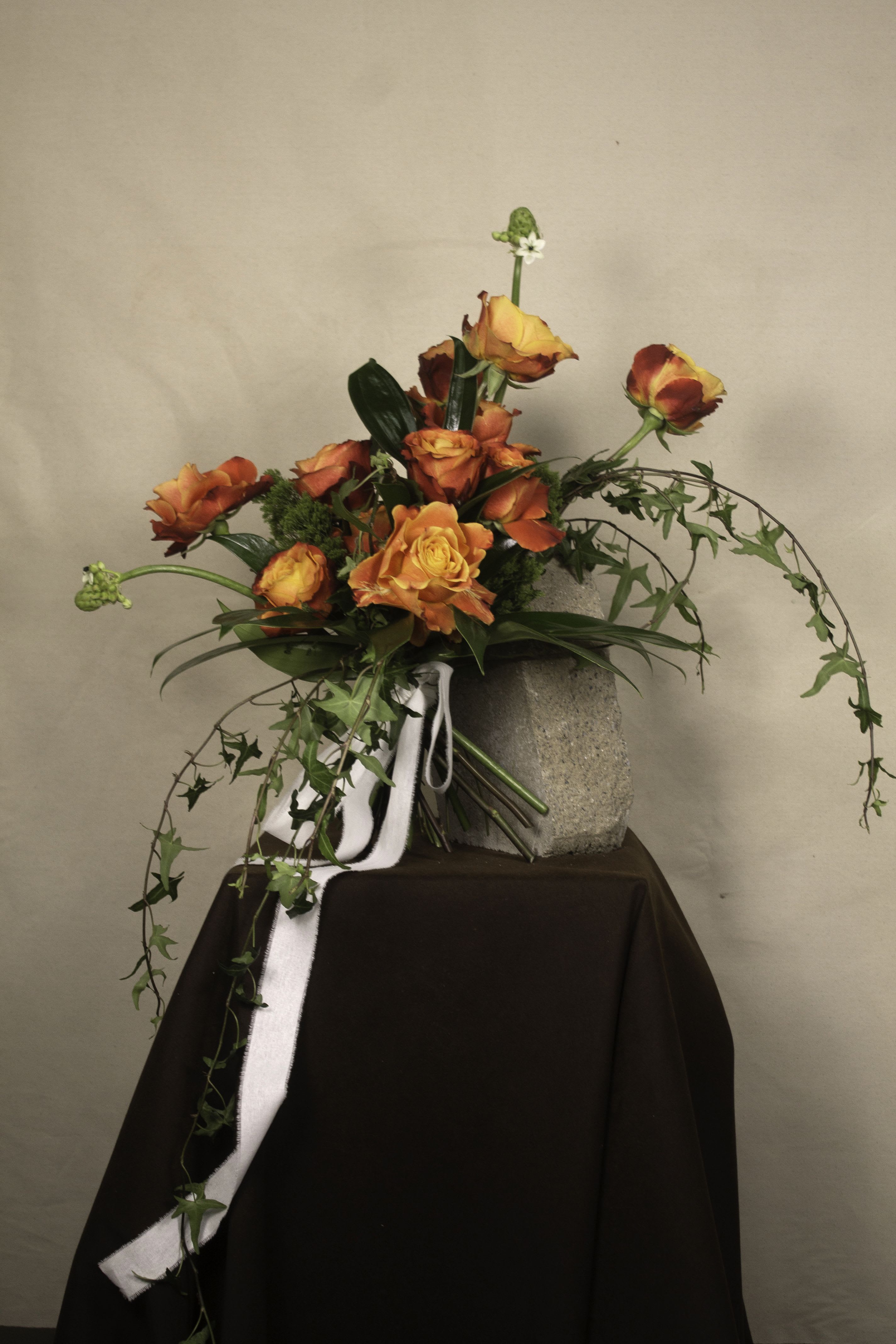 Dozen Roses Bouquet - A bouquet of timeless elegance, featuring a dozen premium roses wrapped beautifully to highlight their natural grace. Perfect for expressing love, gratitude, or celebration, this classic arrangement is available in the color of your choice, making it as personal as it is stunning.  Available Rose Colors : Red, Pink, Hot Pink, Light Pink, Peach, Coral, Orange, Yellow, Green.   ---------------------- At The Burmese Cat Floral Studio, we celebrate the uniqueness of every flower and vase. While the photo captures the spirit of your arrangement, some elements—like one-of-a-kind vessels or seasonal stems—might not always be exactly the same. However, each arrangement will embody the same charm, elegance, and artistic flair.  If substitutions are needed due to weather, seasonal shifts, or market availability, we’ll stay true to the mood, colors, and style you’ve chosen. Rest assured, any replacements will match or exceed the value of the original design.  If there’s something specific that’s a must-have for your arrangement, just let us know in the notes at checkout or reach out directly—we’ll do our best to make it happen! ----------------------