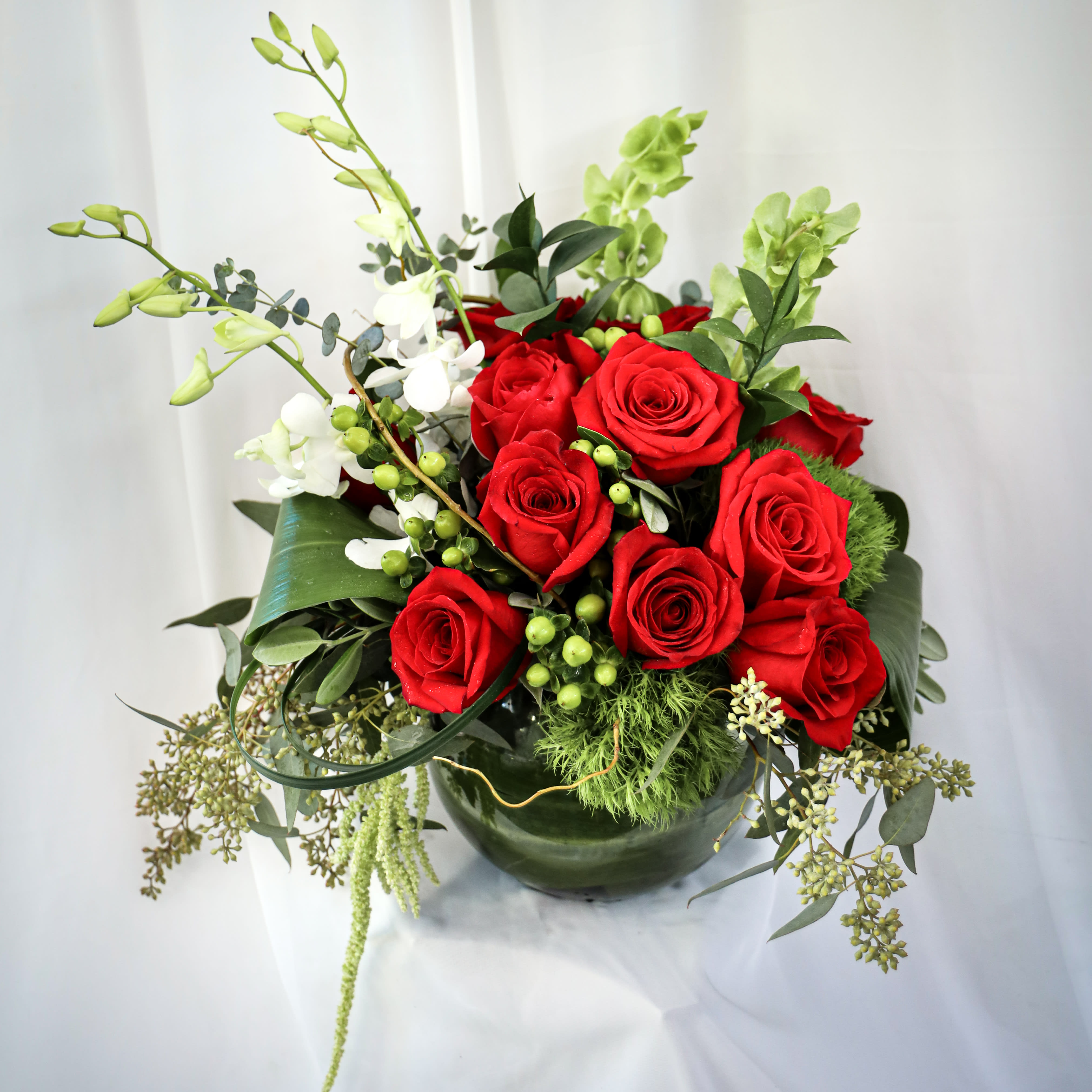 Bowl of Roses and Orchids Bowl of Roses and Orchids - Enjoy this beautiful bowl of Roses and Orchids.