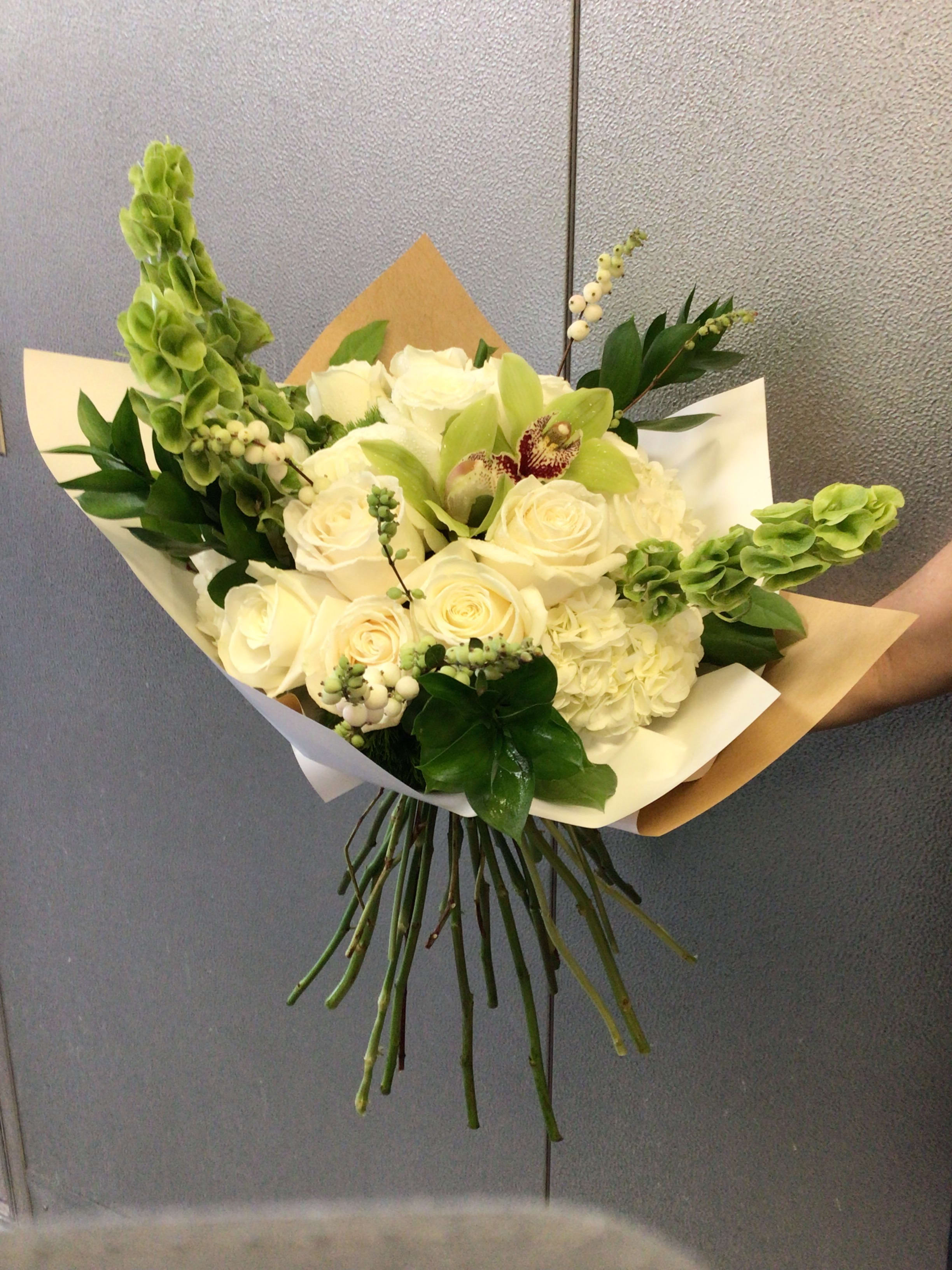 Gentle Touch Hand Tie Bouquet - A Classic all white Bouquet perfect for a special someone who has plenty of vases at home.  
