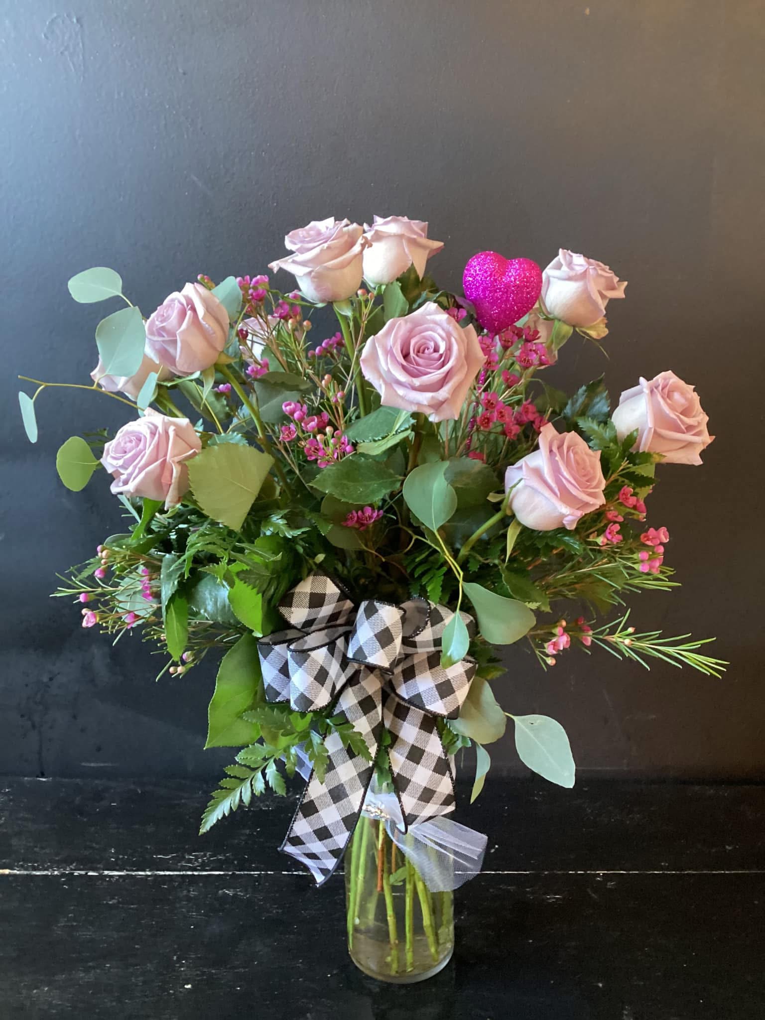 1 Dozen Colored Roses - 1 dozen, premium colored roses, Vased with lush greens, filler and a bow. Color choices for Valentine’s Day: Red, Pink or Purple.