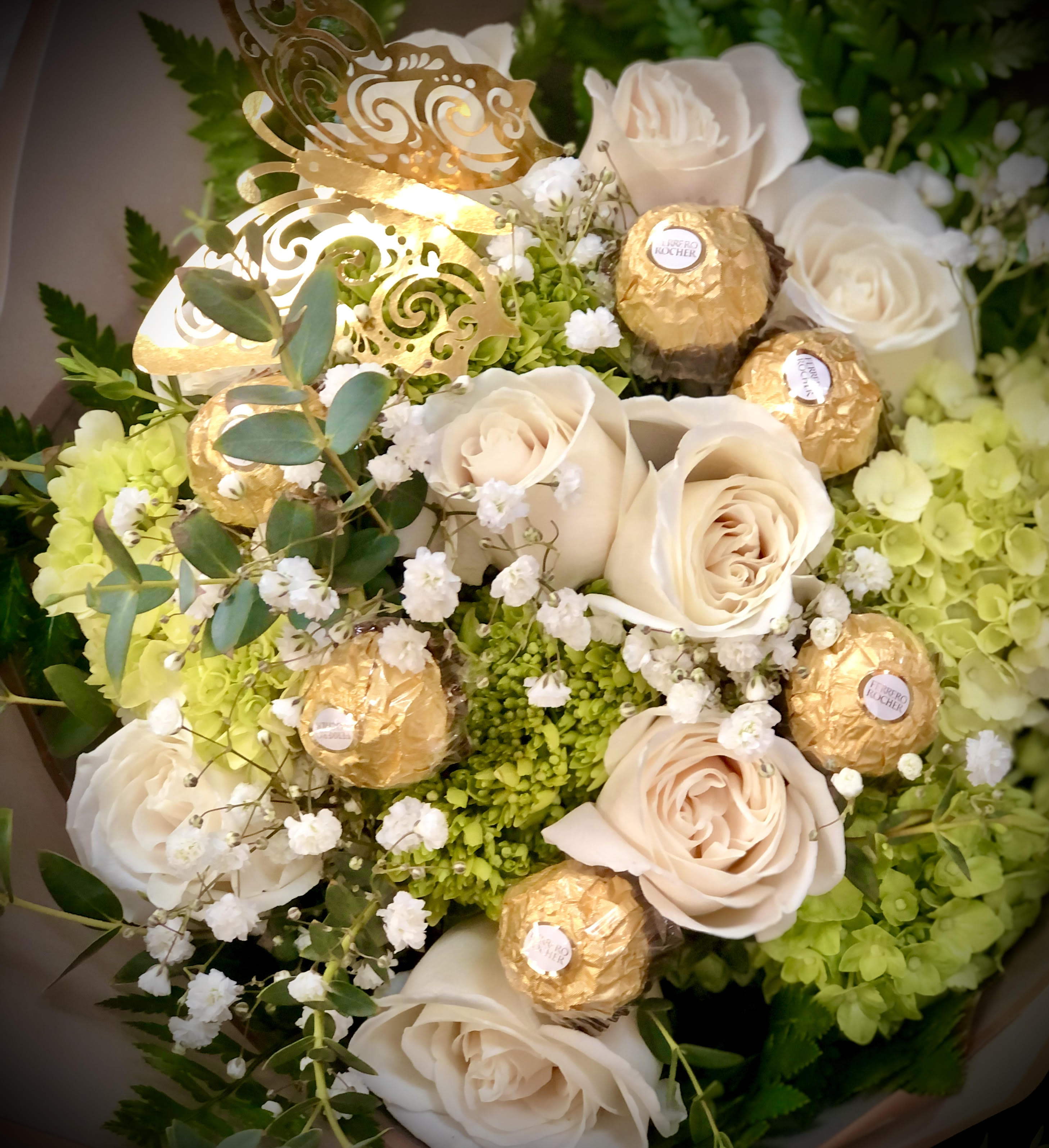 Bouquet of Roses with Gipsophila and Ferrero Rocher Bouquet of Roses with Gipsophila and Ferrero Rocher