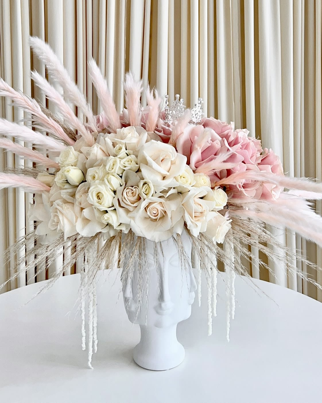 Little Princess Little Princess - Surprise a little princess with this dreamy array of pampas, amaranths and touches of pink with a beautiful keepsake crown that will definitely not go unnoticed.