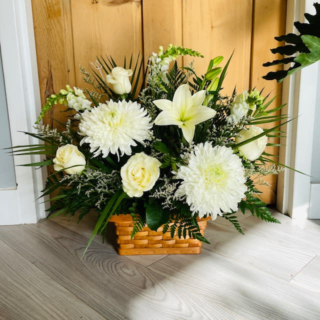 Sympathy Basket - Pictures are examples only. Prices are our starting price and may not reflect the pricing of sample pictures.  Orders placed online will be filled as florist's choice to the price point selected.  Please call or visit us to place a specific order. 