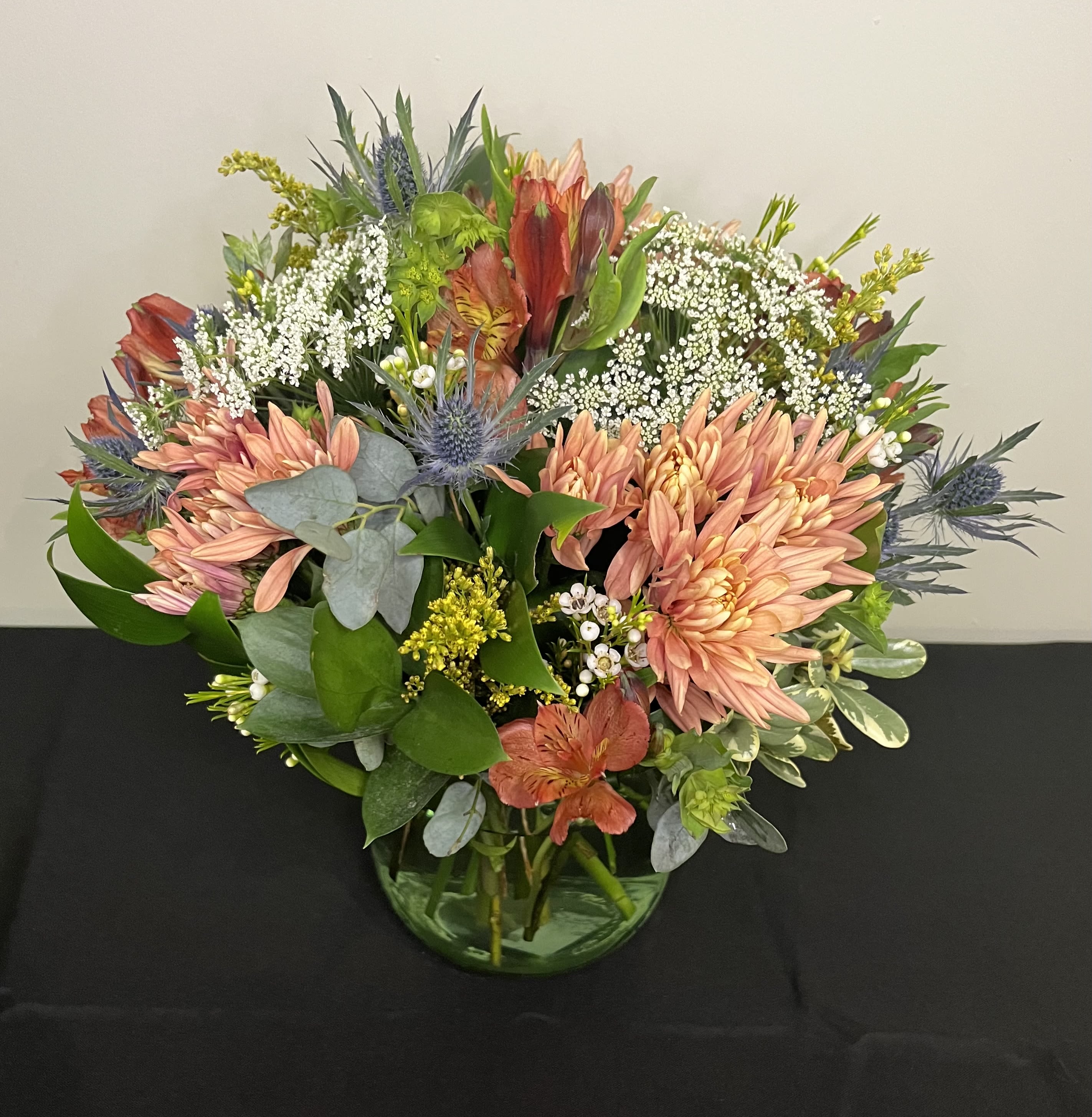 Wildflower Wonder by Chasing Petals - A low vase arrangement of mixed wildflowers including thistle, queen anne's lace and solidago. 