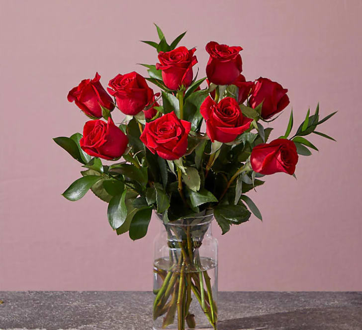 Classic Red Roses  - A True floral classic! No more needs said A dozen premium long stem red roses arranged in a vase