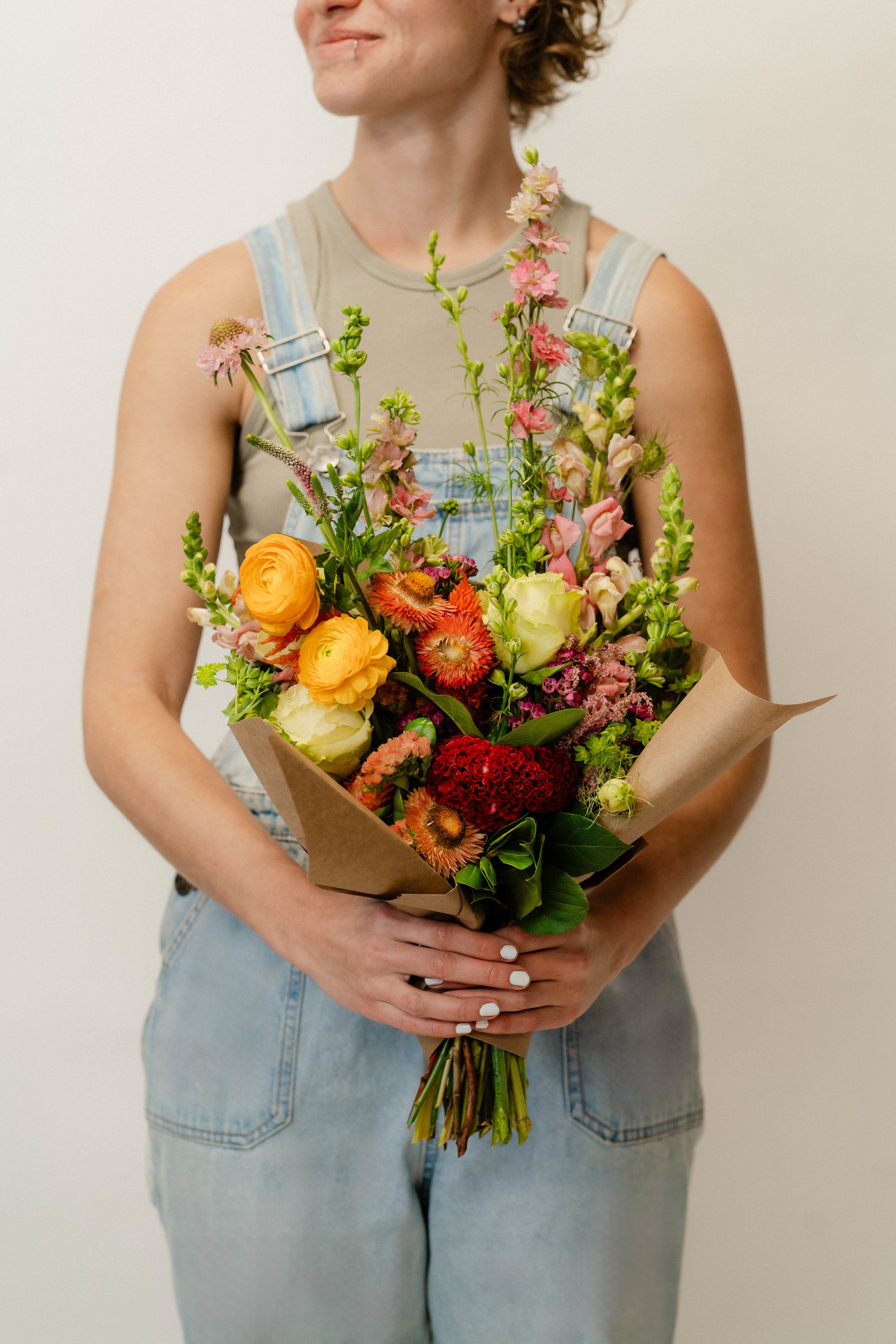 Large Hand-Tied Bouquet - Large Bouquet - 22-24 stems (depending on price and availability) of high-end, fresh flowers and greenery - wrapped in a nice paper for protection and presentation. A great gift idea if you're looking for something showy and luscious, or if you're just looking to brighten your own day!     *Please note - hand-tied bouquets DO NOT come in a vase with water*