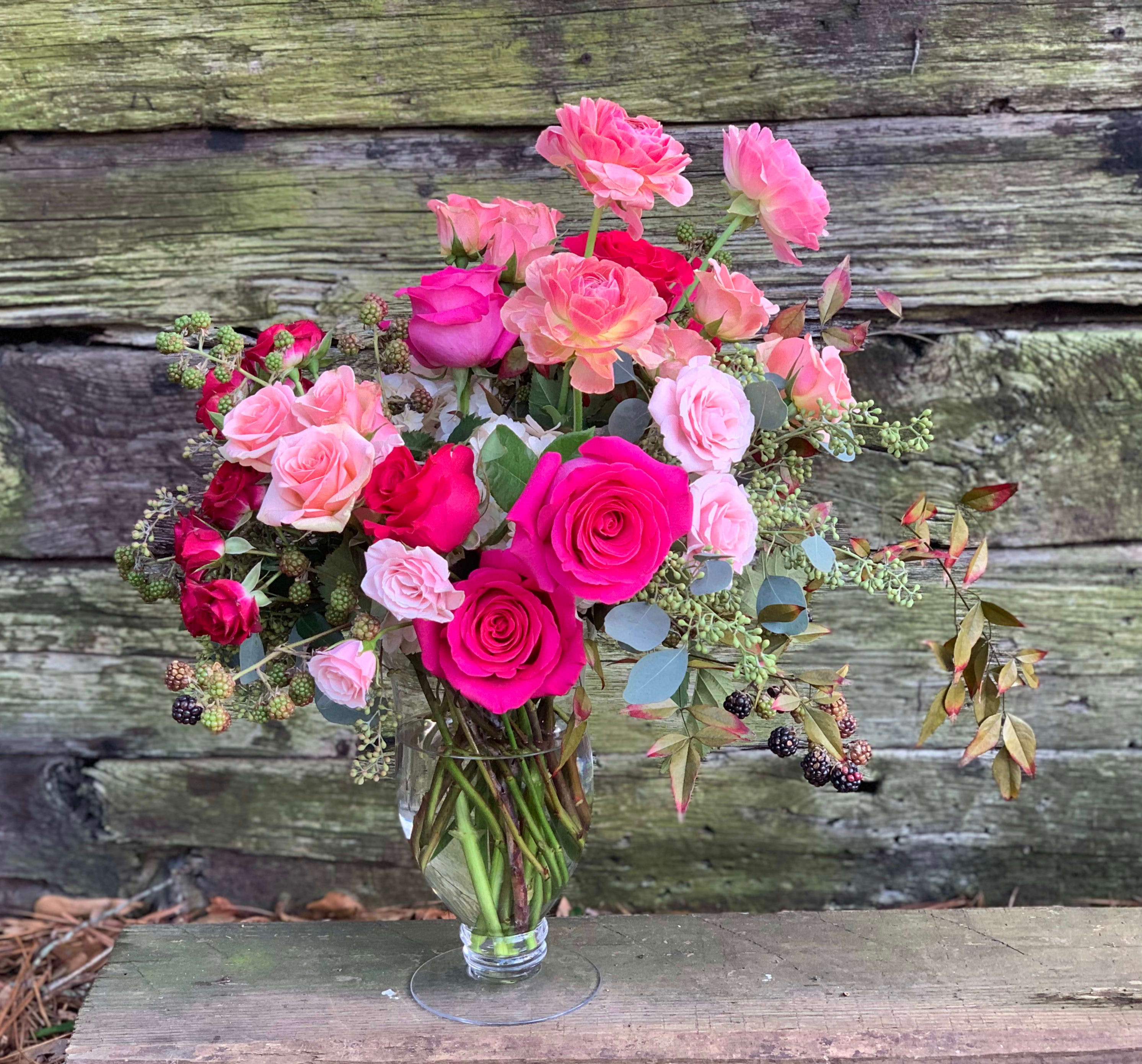 How Much Do You Love Me? - Say it Loud!  This lusciously romantic vase filled with beautiful, supple blooms is sure to win your loves heart!  A true show stopper....