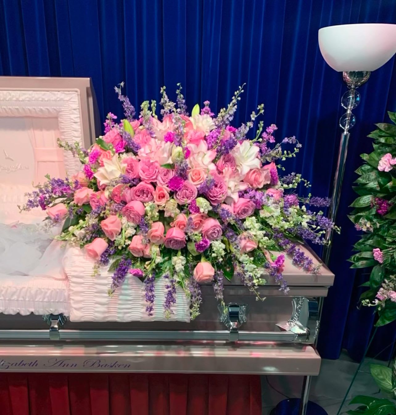 A Mothers Love by Art Of Remembrance A Mothers Love by Art Of Remembrance - A mixture of premium flowers to display the tenderness of a mother’s heart.