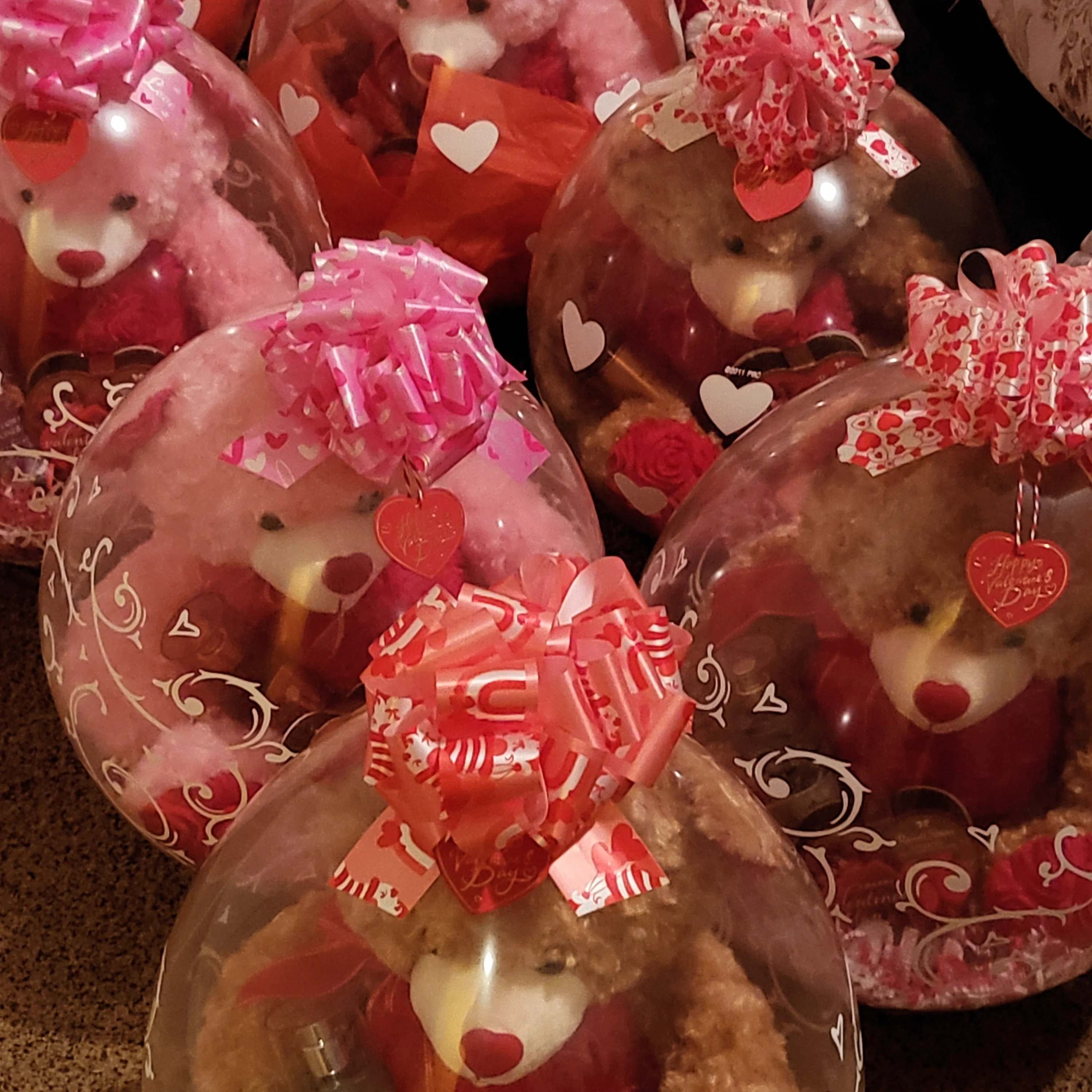 Stuffed Teddy Balloons Stuffed Teddy Balloons - A 12-14 inch teddy bear stuffed in a balloon. Balloon also contains a Bath and Body works spray and a small heart shape box of Chocolates.