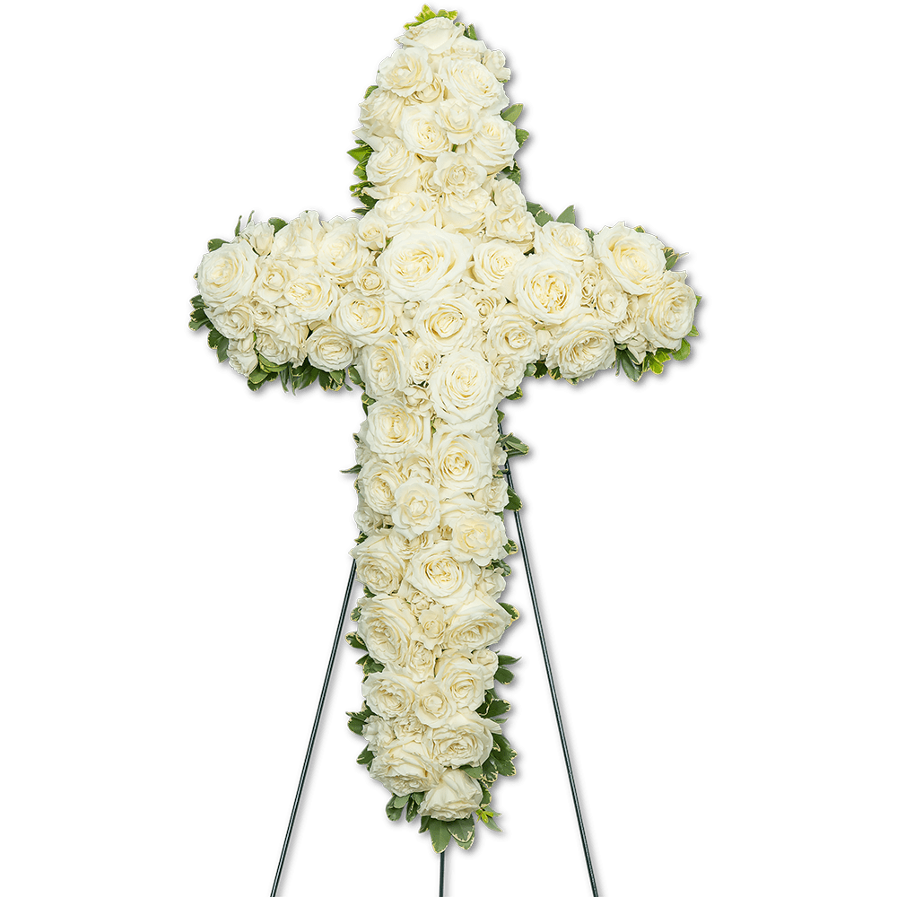 Pure Serenity Cross Pure Serenity Cross - The Pure Serenity Cross is a timeless and heartfelt tribute to honor the memory of a loved one. Crafted with care and compassion, this elegant standing cross spray captures the essence of peace and offers solace during times of grief. Shaped in the form of a cross, this floral spray stands as a symbol of faith, love, and remembrance. It features a delicate blend of roses, spray roses, and premium foliage. Each element of the Pure Serenity Cross is thoughtfully arranged by our floral designer and serves as a comforting presence during the memorial service or funeral.