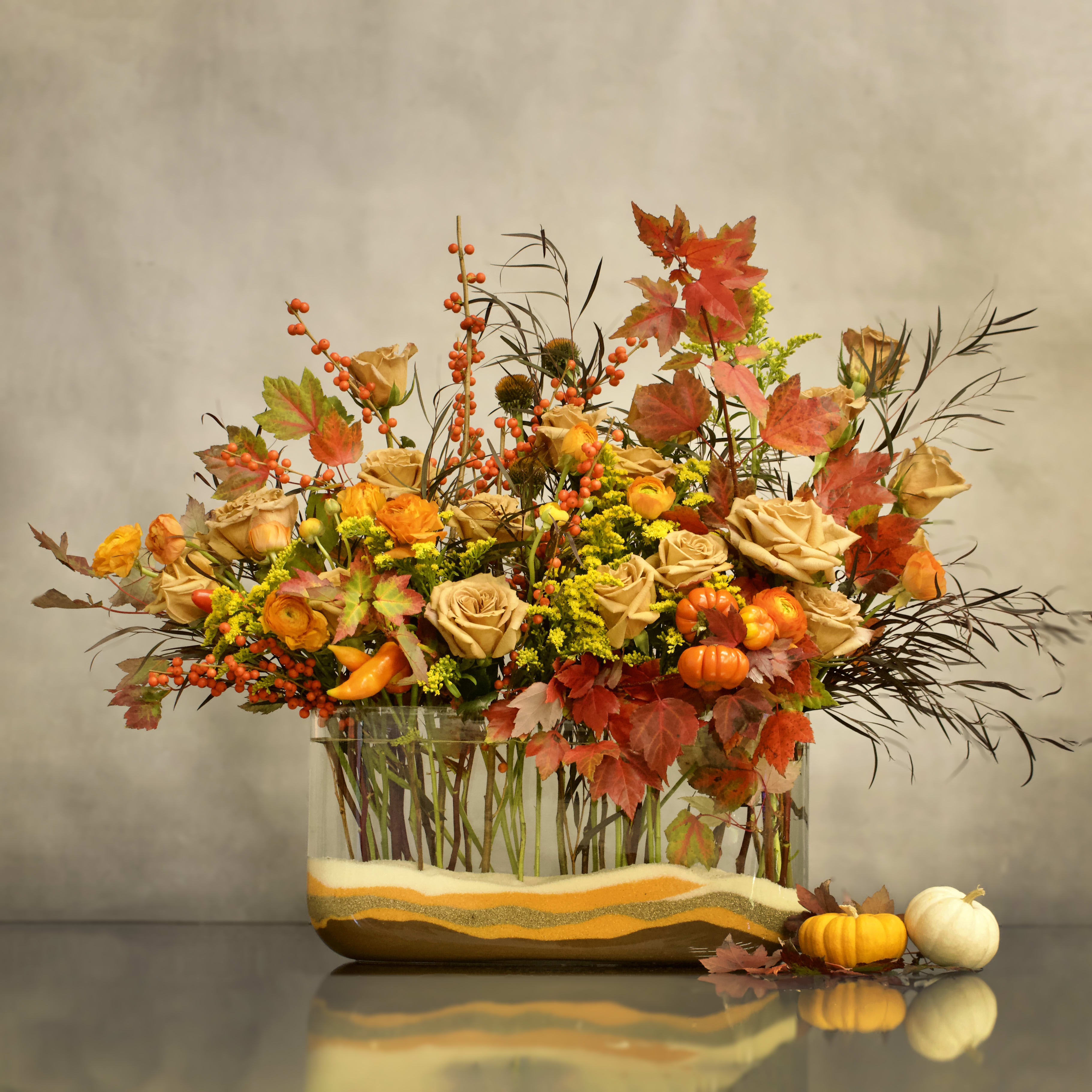 Fall Happiness - This fun fall arrangement really lights up in any room. This is perfect as centerpieces for Fall spread.