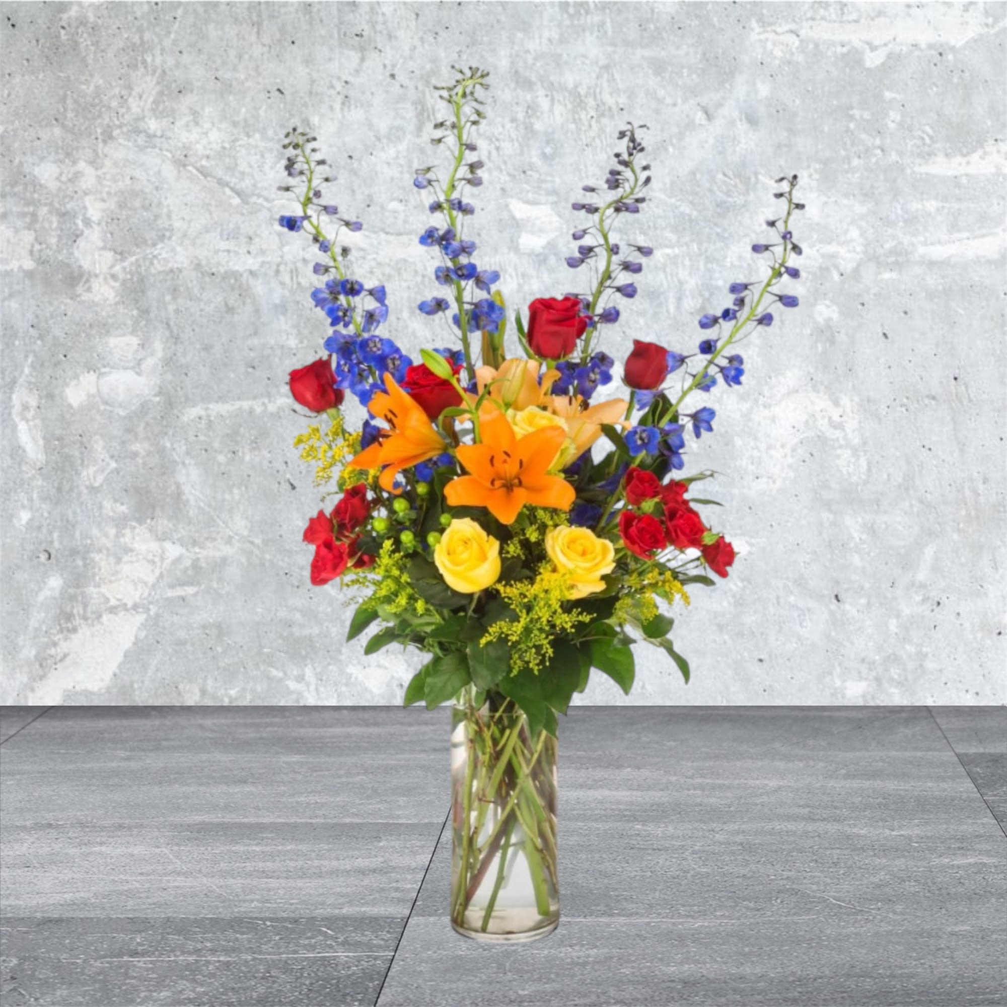 Ravishing Rainbow - A full rainbow of colors in this arrangement makes it a perfect arrangement to send to brighten up any space. A tall vase and height-defying flowers make it a great option for lifting someone's spirits.  