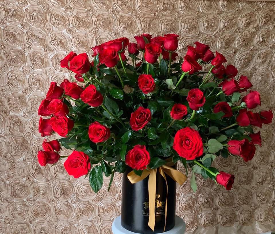 Luxury 100-Rose Premium Cylinder Luxury 100-Rose Premium Cylinder - Luxe 100-Rose Premium Cylinder: Fresh Elegance in Bloom Elevate your gifting experience with our extraordinary Cylinder of 100 Premium Roses - a breathtaking display of timeless romance and unparalleled sophistication. This exquisite arrangement transforms traditional floral gifting into an unforgettable statement of luxury. Key Features and Benefits Unmatched Quantity: 100 meticulously selected premium roses, creating a stunning visual masterpiece Elegant Cylindrical Design: Sleek, modern container that showcases each rose with architectural precision Long-Lasting Beauty: Carefully arranged red roses maintaining vibrant color and pristine appearance Versatile Gifting: Perfect for Valentine's, anniversaries, weddings, corporate events, or extraordinary romantic gestures