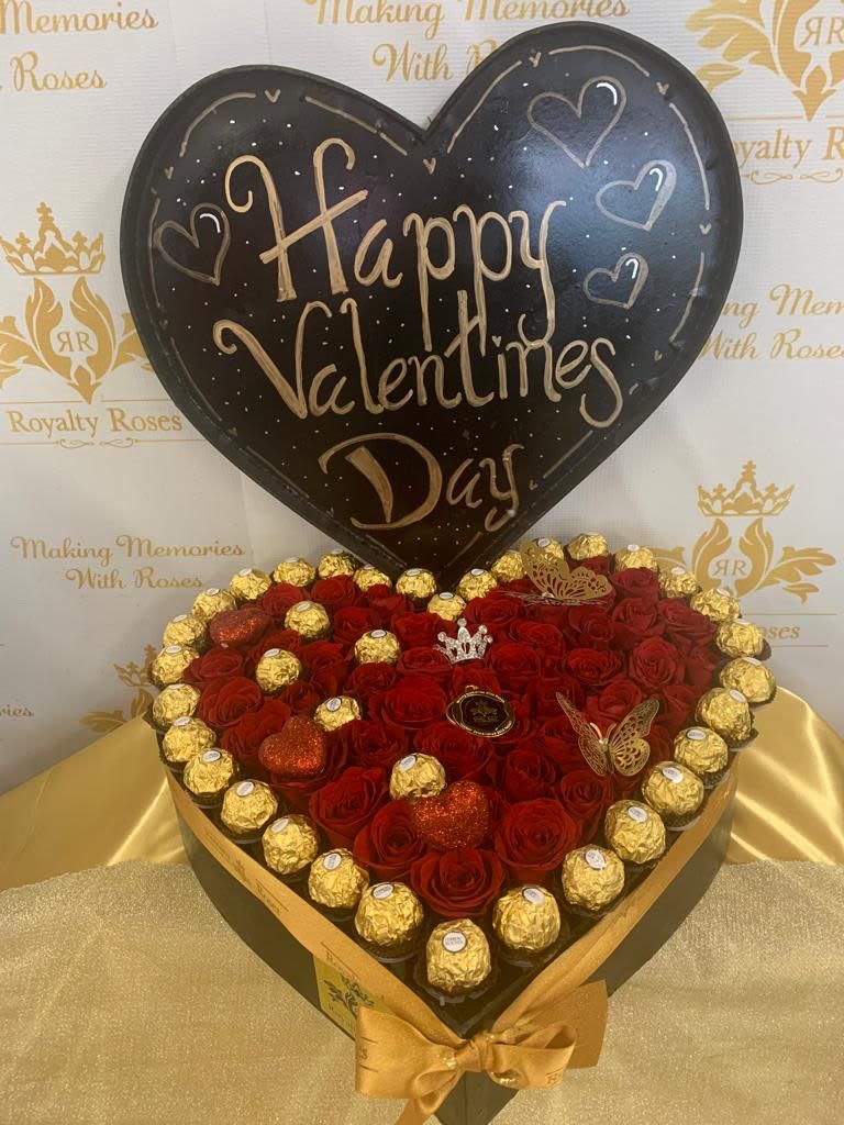 Luxe Heart 2 Roses and Ferrero - Our Luxe Heart Roses and Ferrero package is a stunning romantic ensemble designed to captivate and delight. Perfect for anniversaries, Valentine's Day, or any moment you want to express deep affection. Key Features and Benefits Exquisite Presentation: Beautifully arranged heart-shaped rose arrangement paired with premium Ferrero Rocher chocolates Premium Quality: Hand-selected roses at peak freshness, complemented by world-renowned Ferrero chocolates Emotional Impact: Creates an unforgettable gifting experience that speaks volumes of your love and thoughtfulness