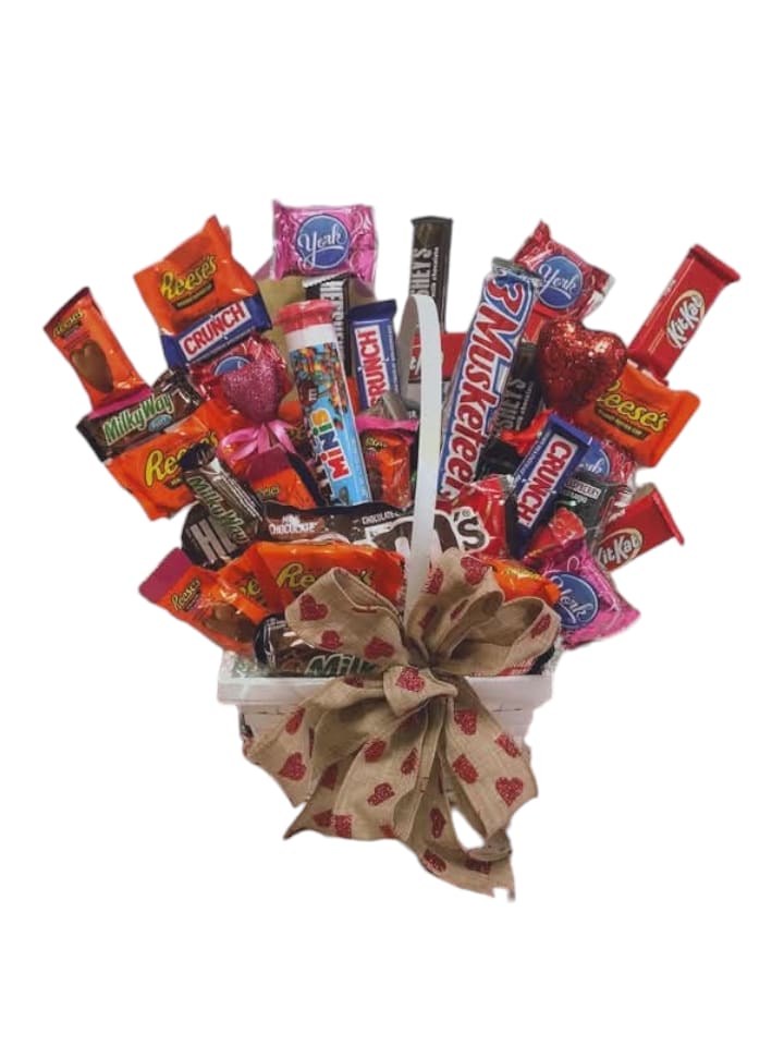 Choco-Licious Delight Basket - Dive into a world of sweetness with our Choco-Licious Delight Basket! Overflowing with an irresistible assortment of chocolate candies and bars, this delightful basket is your ticket to a sugar-fueled adventure. Whether you're treating yourself or sharing the joy with friends, each bite promises to be a moment of pure bliss.  Perfect for any occasion, this basket is not just a gift; it's a celebration of all things chocolate! Just remember to let us know about any allergies or preferences in the note section, so we can tailor this sweet surprise just for you. Get ready to unwrap happiness, one delicious piece at a time!