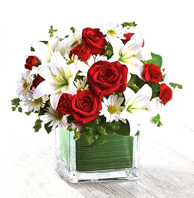 Be Mine - BE MINE BOUQUET BY TWIN TOWERS FLORIST.   RED ROSES, RED MINI CARNATIONS, WHITE LILIES AND WHITE DAISES WITH BUPLEURUM AND SALAL TIP GREENERY.  ARRANGED IN A CLEAR GLASS VASE WITH LINER