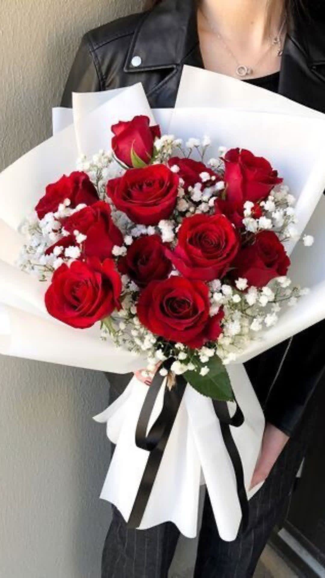 Love Me Roses Love Me Roses - (Standard)12 Beautiful Ecuadorian Red Roses With Babys Breath Hand Tied Bouquet, Wrapped Elegantly In Paper With Satin Ribbon. (Vase Not Included)