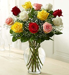 A Bright Dozen Mixed Long Stem Roses (AVAILABLE NOW!) A Bright Dozen Mixed Long Stem Roses (AVAILABLE NOW!) - Special Price is for Local Delivery only or Pick up. Say it with color! A bright mix of long stem roses with baby's breath and mixed greenery are perfect for all occasions! This is a true customer favorite. (Selection of Color is based on our store inventory) These are long stem roses.
