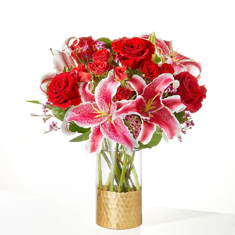 Match Made in Heaven Bouquet - Blooming red roses, exquisite lilies, and accents of spray roses are expertly designed by your local florist to remind that special person how loved they are.