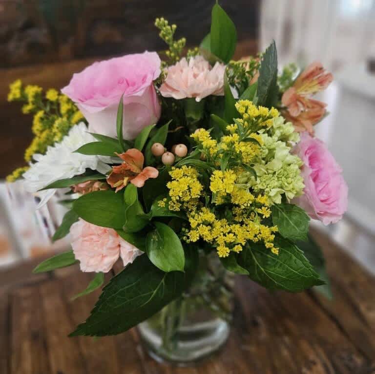  Deal Of The Day-Colorful - Pink roses, peach carnations, orange alstromeria, green hydrangea, peach hypericum berries and solidago in a cinched vase