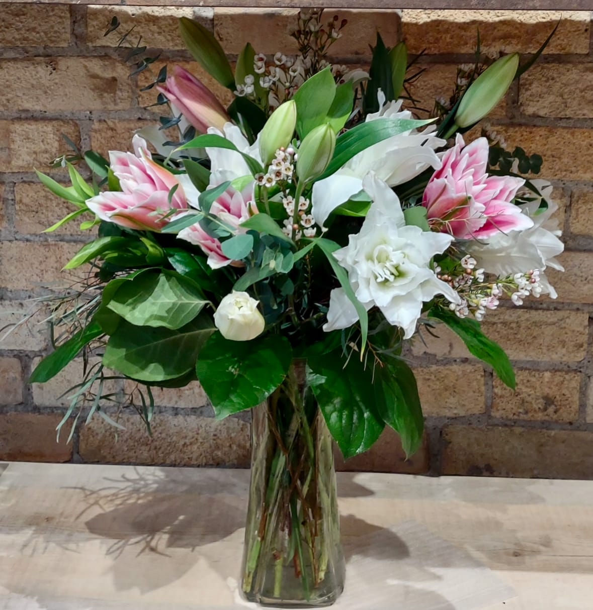 Just a Lily Something Just a Lily Something - A mix of white Oriental and pink Stargazer Lilies.