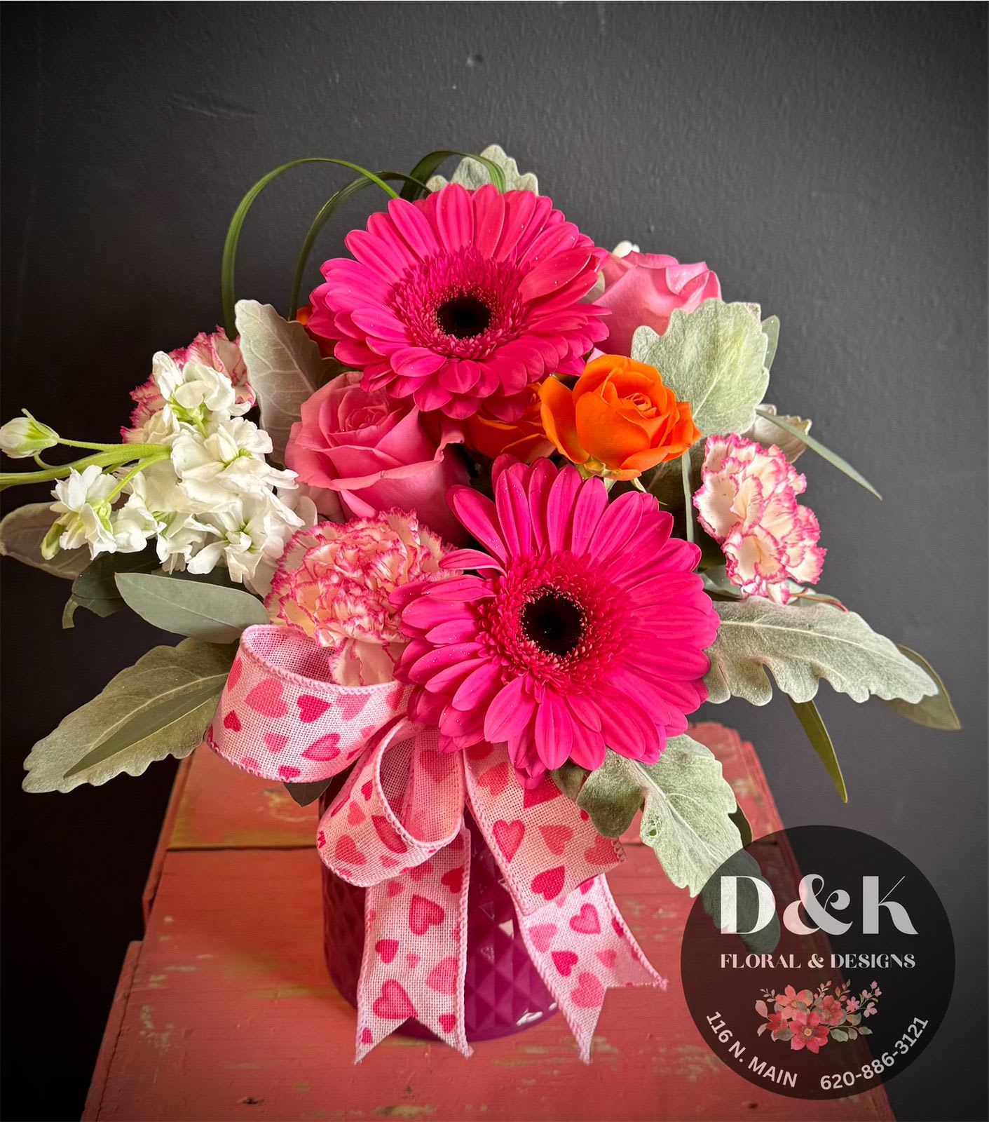 Pretty in Pink! - Mixed pink bouquet with accents of white and orange. May include roses, spray roses, gerbera daisies, stock, and carnations. Substitutions will be made upon in stock availability. 