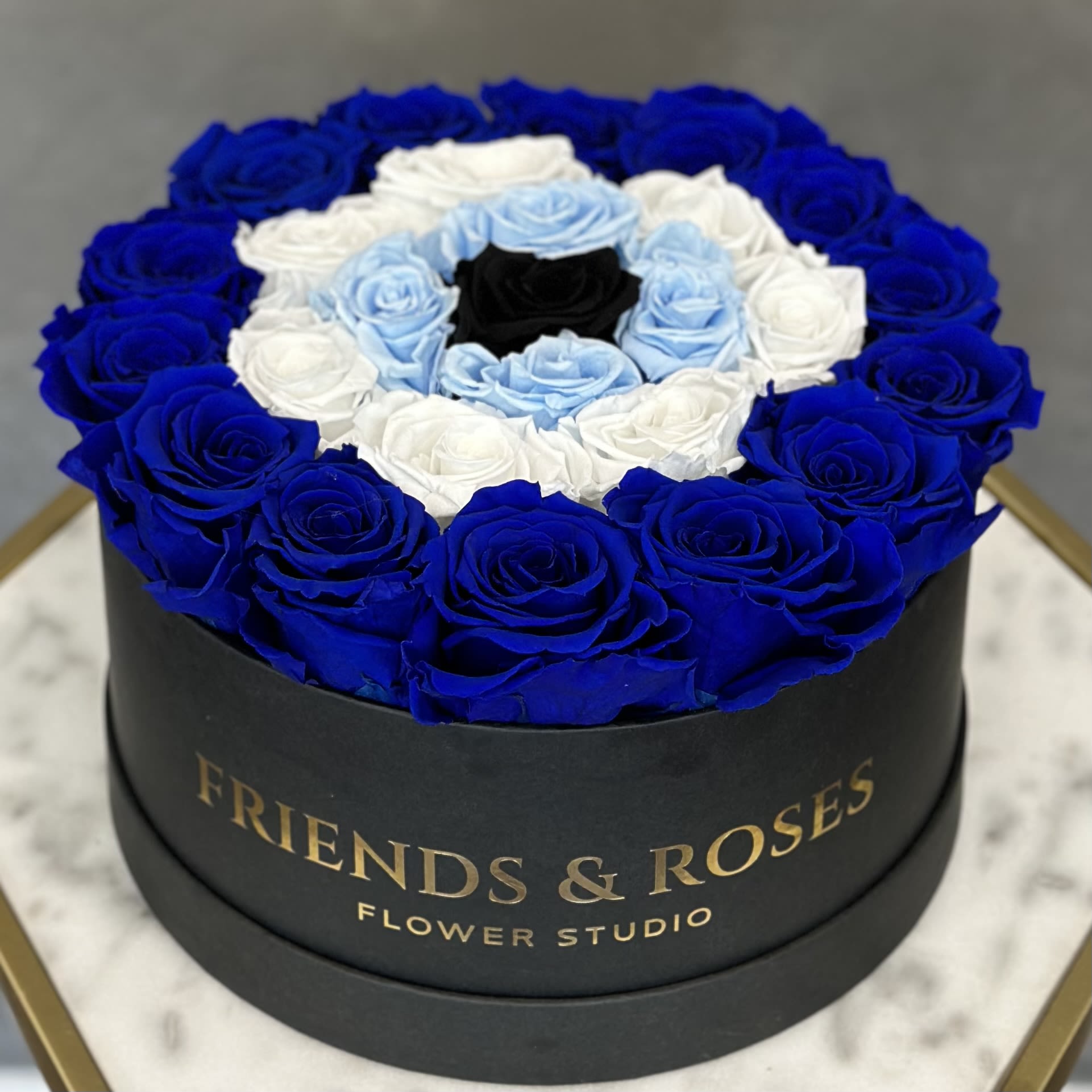 Evil Eye Protection ( Preserved Roses) - Symbolic creation of an evil eye symbol.  Some cultures consider this symbol to be a protection from evil eyes.  Preserved roses last for over 2 years with no special care. 