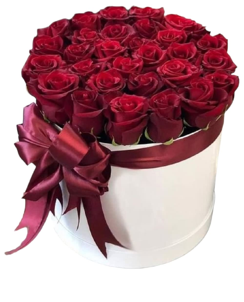 Red Roses White Cylinder Box - Red roses are beautifully arranged in a white cylinder box. Have them delivered for any special occasion or just because.   DETAILS Cylinder box available in white (shown), black, pink, &amp; fire red.  CYLINDER BOX INCLUDED Orientation: All-Around Item #NF-323  FLORIST-TO-DOOR Same day flower delivery on most orders placed online by 12 pm or 10 am on weekends PST.  BLOOM DETAILS Roses  The Standard Arrangement (28 Roses) The Deluxe Arrangement (34 Roses) The Premium Arrangement (40 Roses)  How to place an order? 1. You can place an order directly on this secure website OR 2. You can call in your order by dialing: (323) 262 - 9238 OR 3. You can visit our store (appointment recommended 323.262.9238)  NINFA'S FLOWERS 2405 WHITTIER BLVD. LOS ANGELES, CA. 90023  ATTENTION: *Please note that on busy holidays, Valentine's Day, and Mother's Day, we cannot verify if the recipient received the flowers until the following day. You can verify delivery on the website after 10:00 pm, call 323.262.9238 the following day after 10:00 am, or contact the recipient directly. Thank you for your patience and understanding.