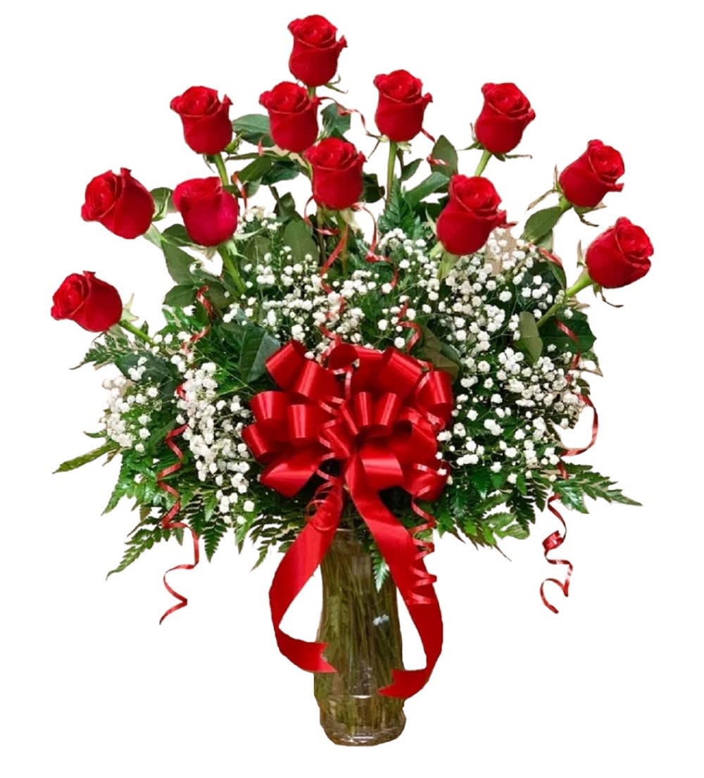 Lovely Red Roses Arrangement - Surprise them with one, three, or five dozen beautiful perfectly red roses. They'll be dazzled by this classic gift - and impressed by your impeccable taste.  DETAILS A beautiful red roses arrangement with baby's breath filler and greens arranged in a clear glass vase.   VASE INCLUDED Orientation: One-Sided Item #NF-482  The Standard Arrangement: 1 dozen red roses (12 stems) The Deluxe Arrangement: 3 dozen red roses (36 stems) The Premium Arrangement: 5 dozen red roses (60 stems)  FLORIST-TO-DOOR Same day flower delivery on most orders placed online by 12 pm or 10 am on weekends PST.  BLOOM DETAILS Red Roses Baby's Breath Filler Greenery  How to place an order? 1. You can place an order directly on this secure website OR 2. You can call in your order by dialing: (323) 262 - 9238 OR 3. You can visit our store (appointment recommended 323.262.9238)  NINFA'S FLOWERS 2405 WHITTIER BLVD. LOS ANGELES, CA. 90023  ATTENTION: *Please note that on busy holidays, Valentine's Day, and Mother's Day, we cannot verify if the recipient received the flowers until the following day. You can verify delivery on the website after 10:00 pm, call 323.262.9238 the following day after 10:00 am, or contact the recipient directly. Thank you for your patience and understanding.