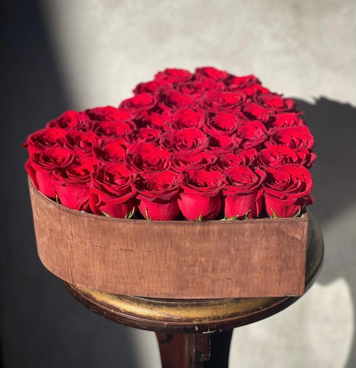 Heart of Roses Heart of Roses - "Surprise your loved one with our romantic Heart of Roses arrangement, featuring a stunning bouquet of fresh roses nestled in a beautiful heart-shaped box, perfect for expressing your love and affection."