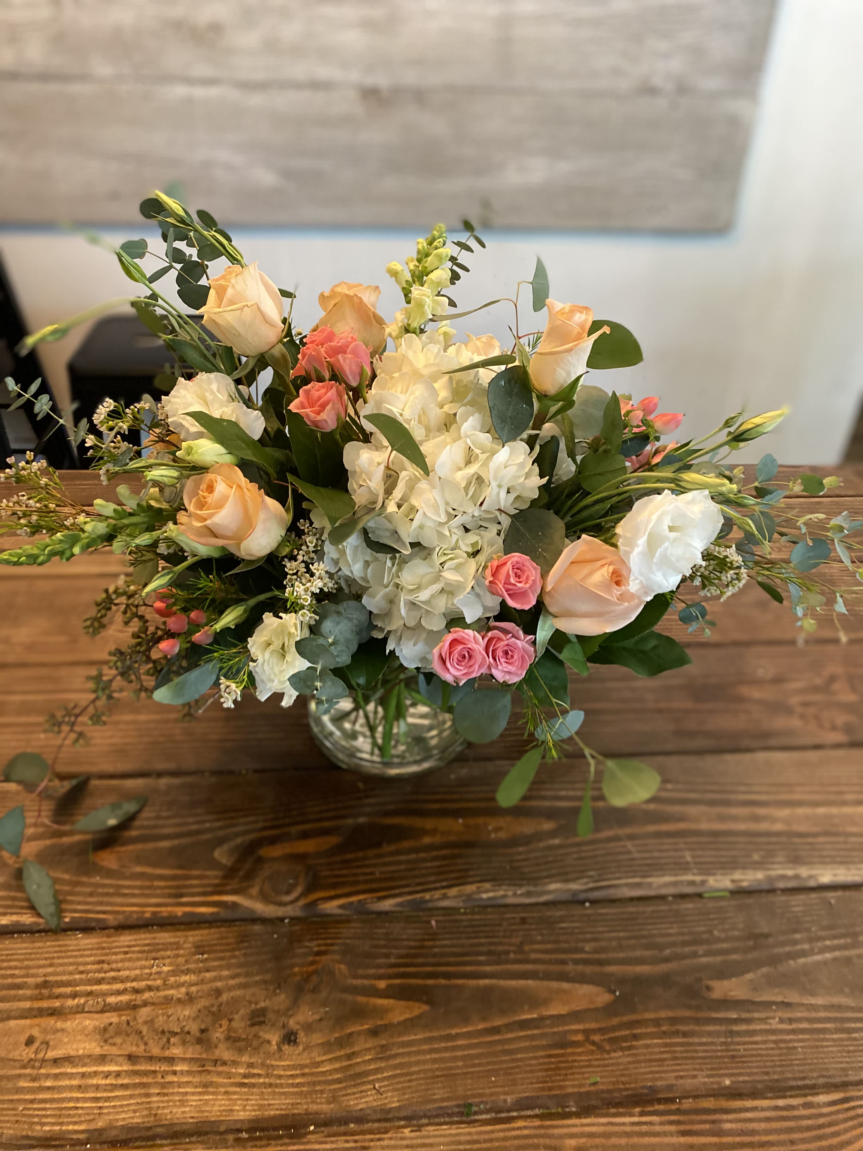 Wild Thing - If you are looking for something rustic and wild, this is your arrangement.  Delivery minimum is $50.00 Our DELIVERY SERVICE IS TILL 3 PM We cannot guarantee requests for a specific time of delivery. There might be flower substitutions, due to low supply of certain flowers. However, we do our best to provide you with the same look and feel of the arrangement. Our main goal is to always give our customers quality flowers and service. To make sure that you get the exact same flowers, ordering a few days ahead of desired delivery date is key.