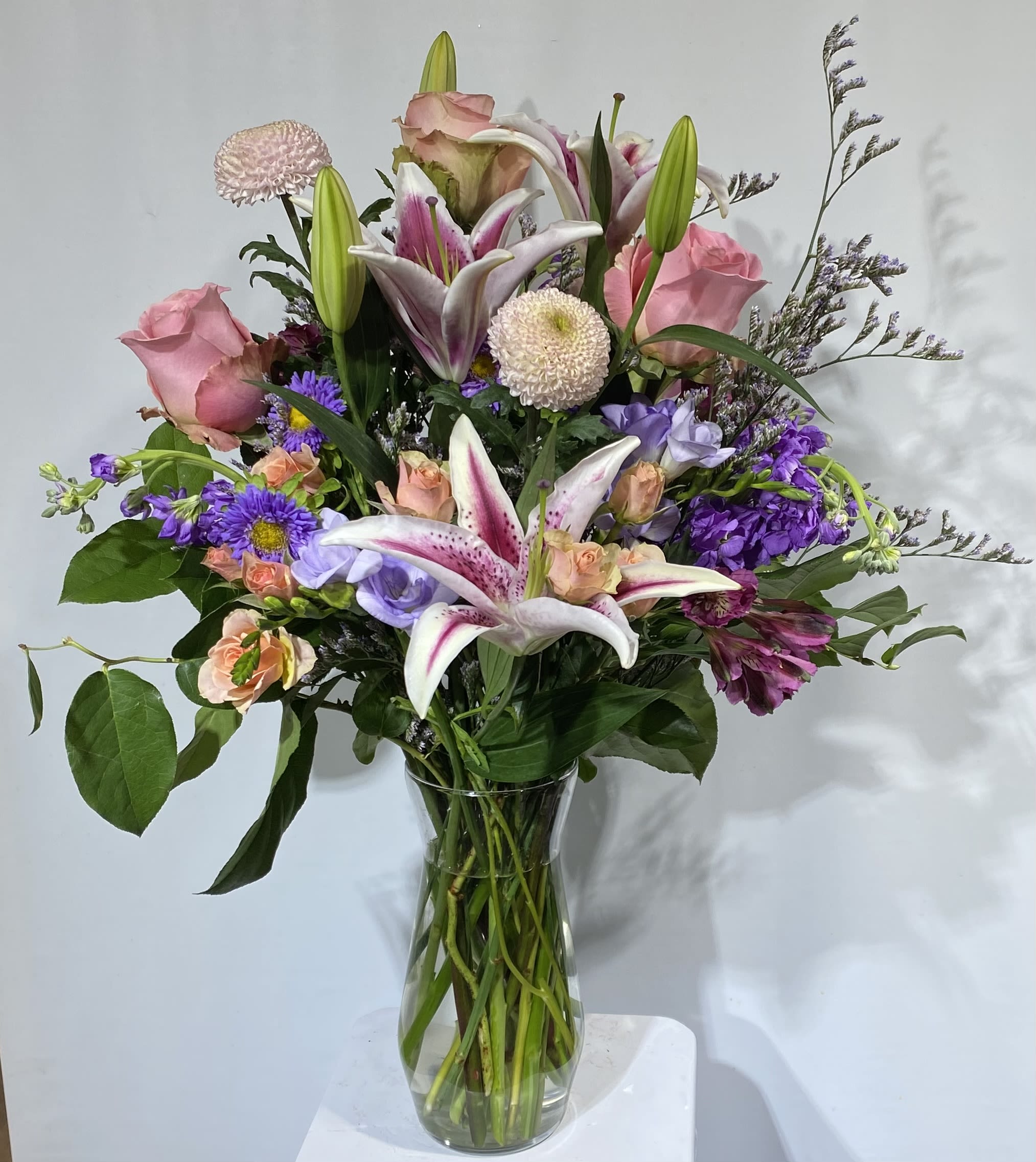 Designers garden. Designers garden. - A full mix of the garden, with roses and assorted blooms to enhance the statement of a love.