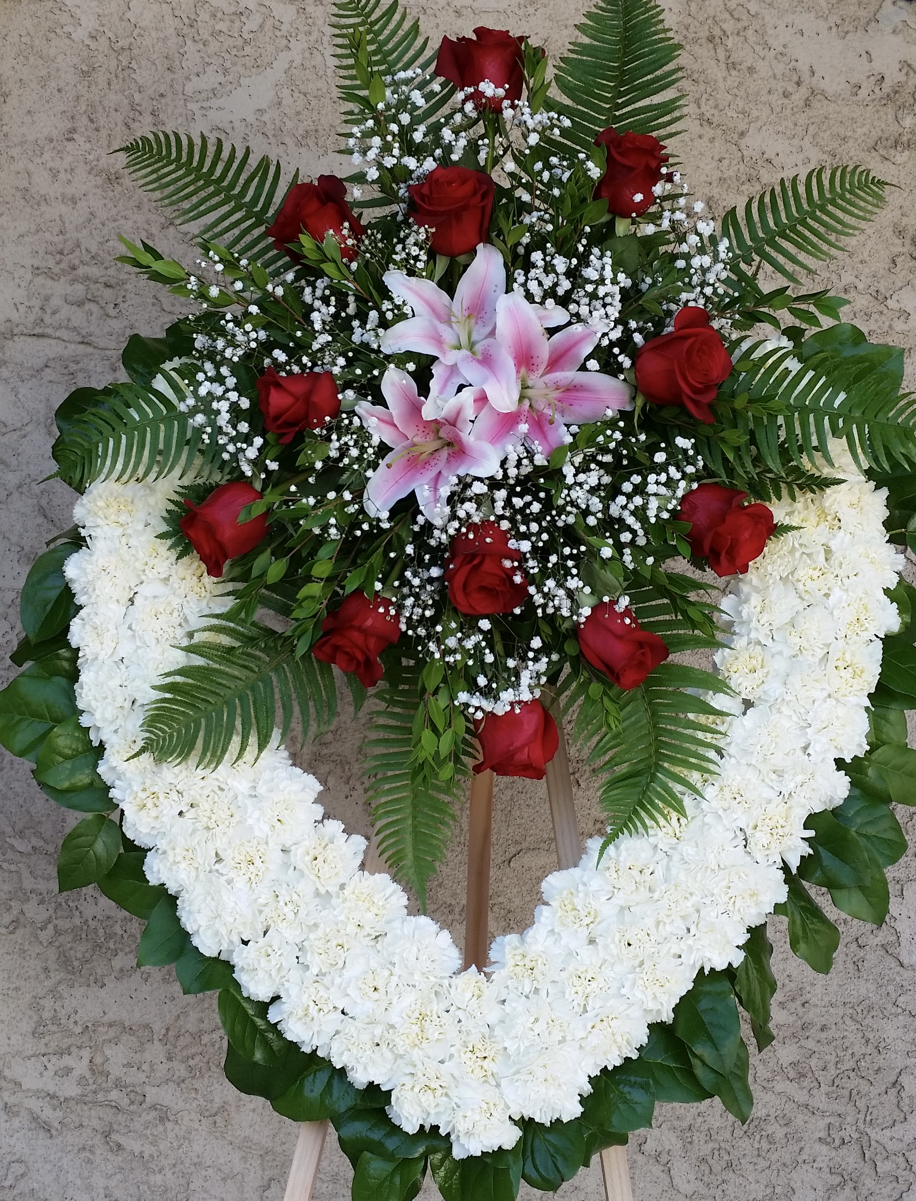Enduring Love Heart Enduring Love Heart - Open heart with white carnations, red roses, and pink lilies.