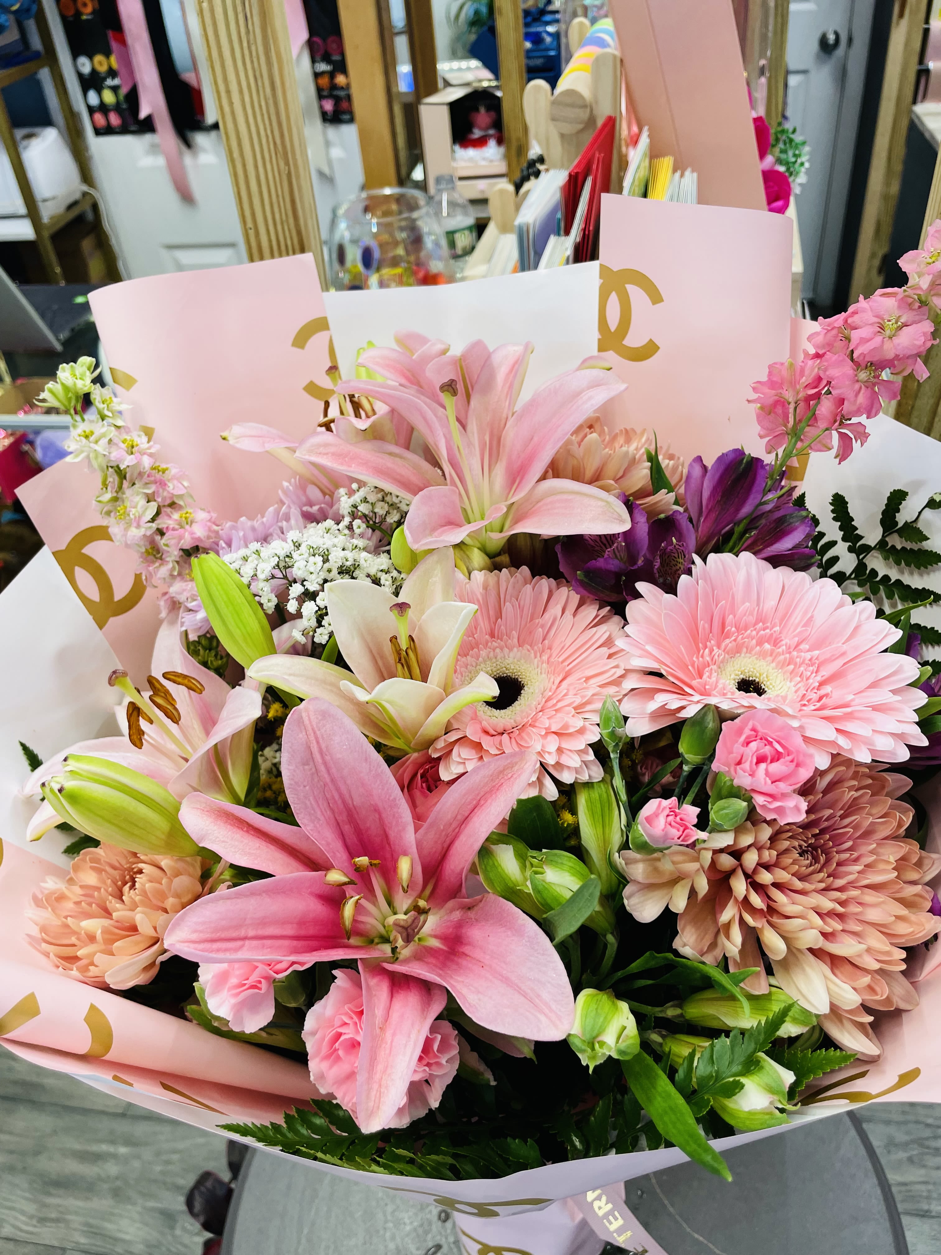 Mixed floral bouquet  - This beautiful bouquet contains all kinds of pink and purple flowers that are perfect for any occasion! 