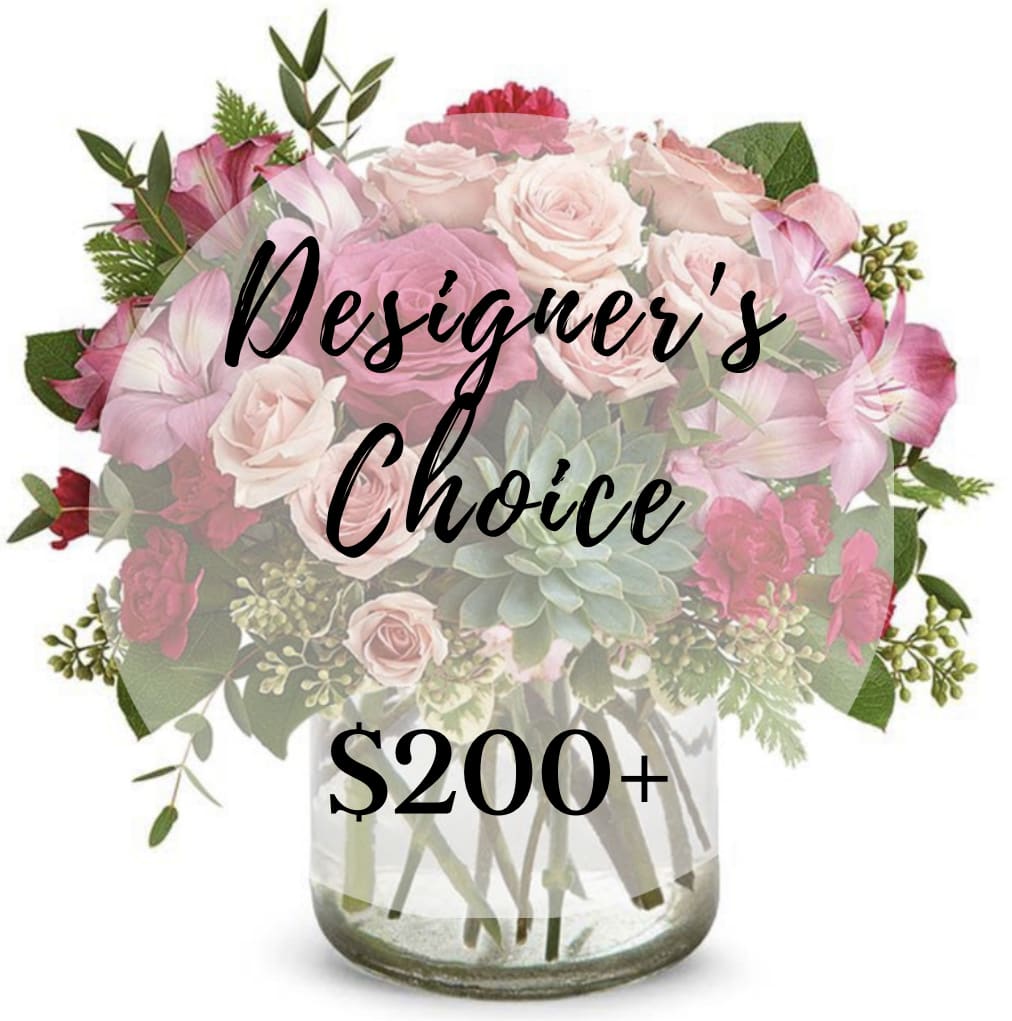 Designers Choice +200 Designers Choice +200 - Hand-crafted designs with the freshest seasonal flowers in a clear glass vase handpicked by our talented designers!