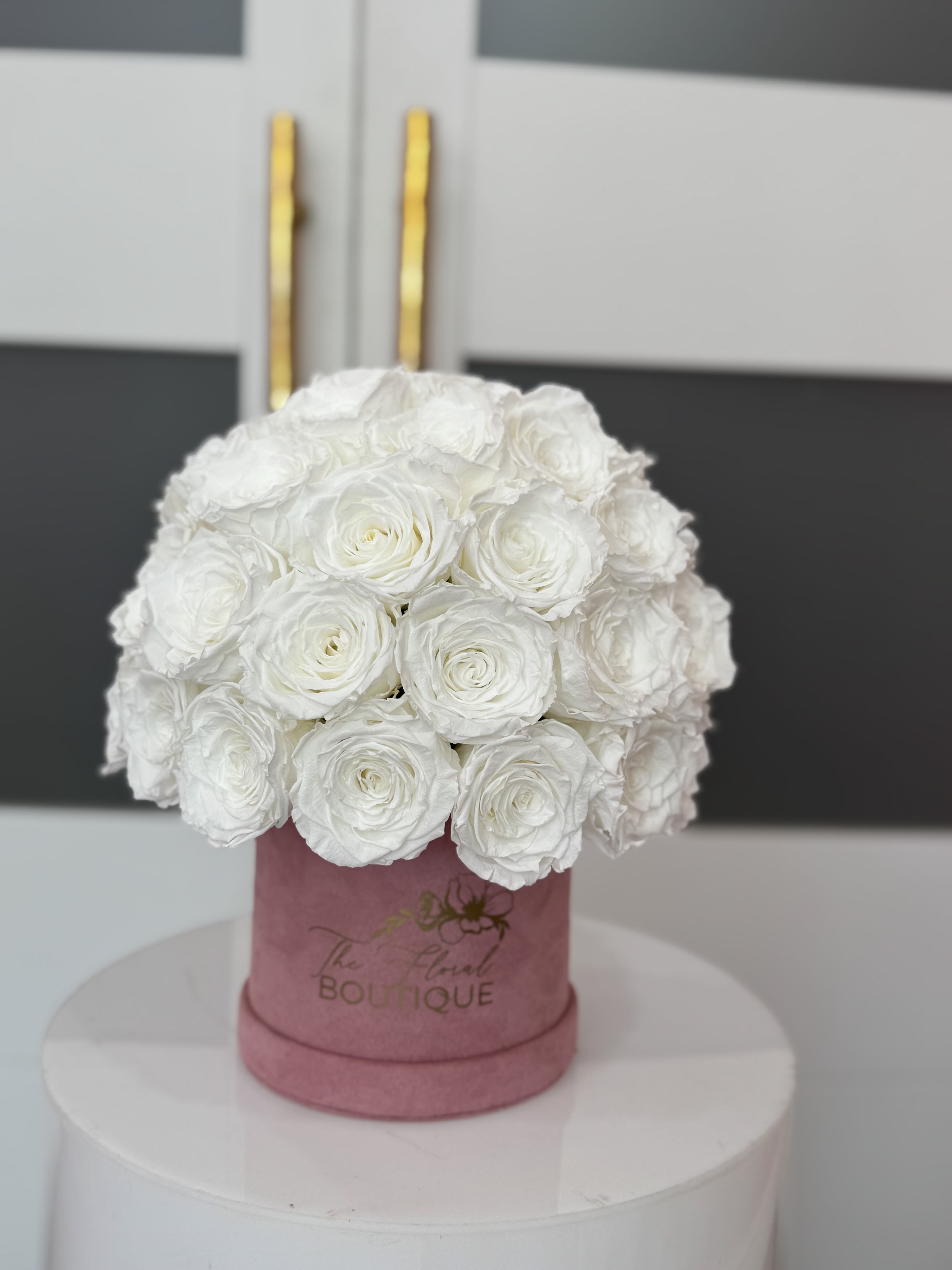 Preserved 48 white Rose Box  - Timeless love and elegance with this stunning arrangement of 48 preserved white roses. Encased in a sleek, high-quality box, these roses are expertly preserved to maintain their vibrant color and soft texture for up to a year or more. Perfect for romantic gestures, anniversaries, or simply to show someone how much they mean to you, this arrangement combines beauty and longevity. • Features: • 48 premium preserved white roses • Long-lasting freshness without the need for watering • Chic, reusable box for elegant display  Gift the ultimate symbol of enduring love with this luxurious rose box.