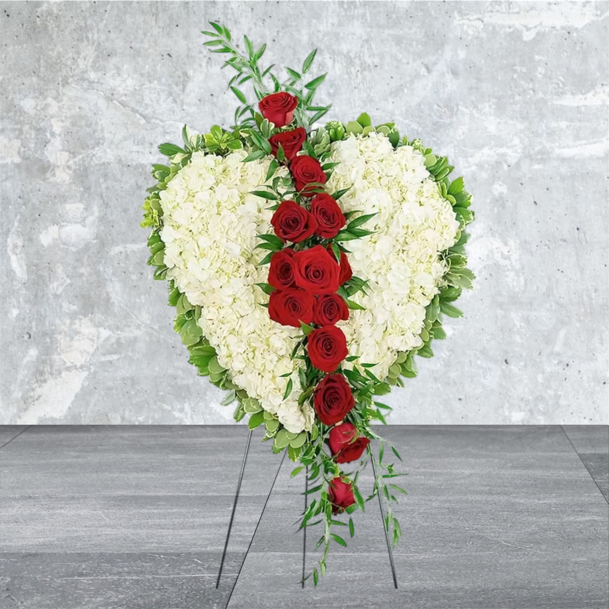 Lost Love Lost Love - Our Lost Love Heart is a classic and beautiful choice for funeral flowers or a celebration of life ceremony. This standing spray features beautiful red roses, white hydrangea, and a variety of premium foliage, artfully designed to be displayed as a broken heart. Red roses symbolize respect, love, and courage in a sympathy design. Funeral flowers are a meaningful way to celebrate the life of the deceased, while providing comfort to the friends and family left behind.