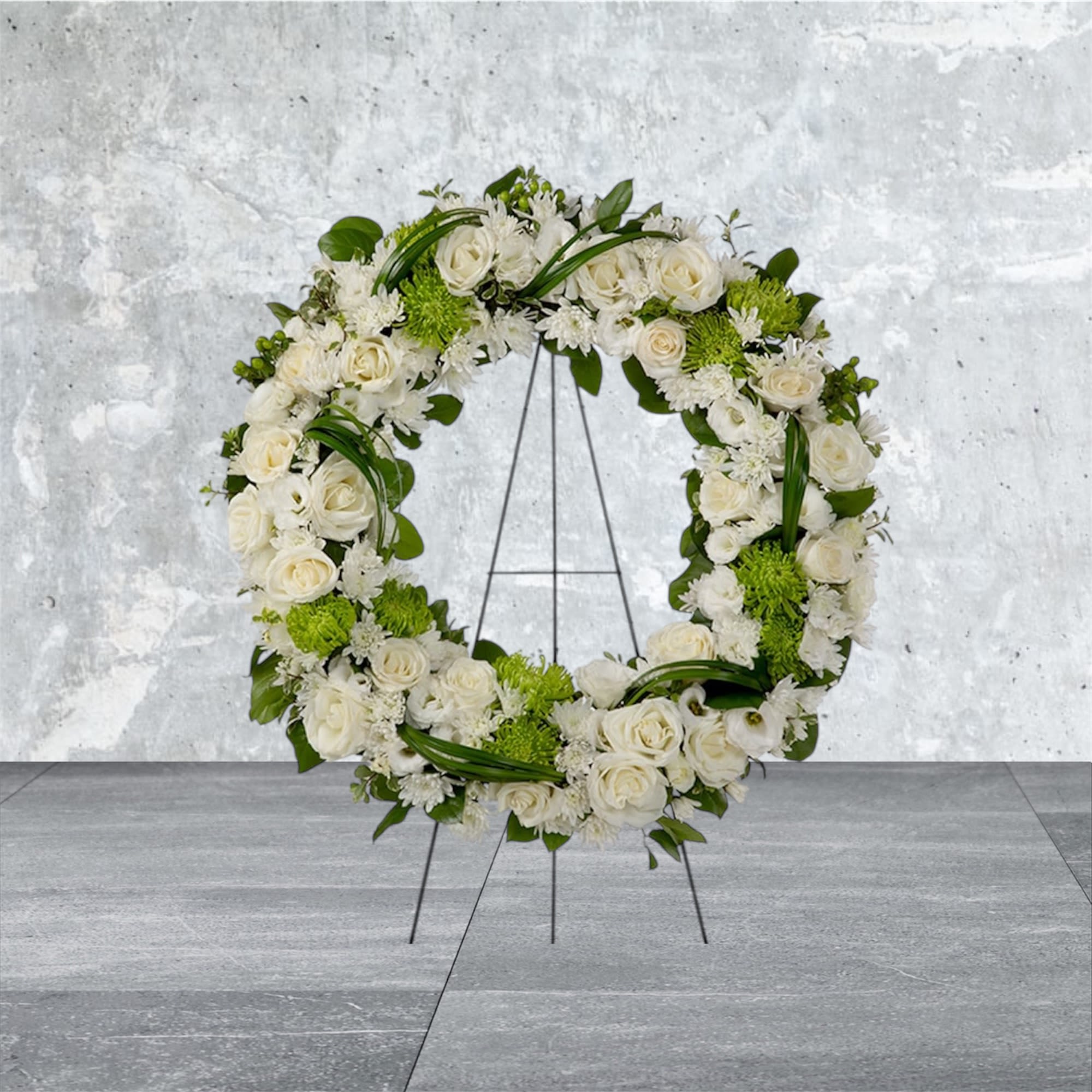 Lasting Serenity  - A beautiful white and green tribute wreath that calms, this easel arrangement celebrates a full life and a peaceful passing. 