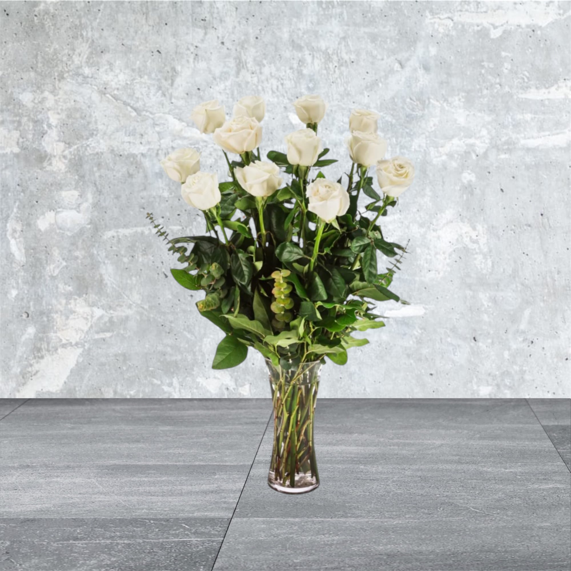 Dozen Long Stem White Roses - A dozen white roses are a classic gift! Perfect for Valentine's Day, an Anniversary, or any type of celebration.  Approximate Dimensions: 20&quot;D x 30&quot;H