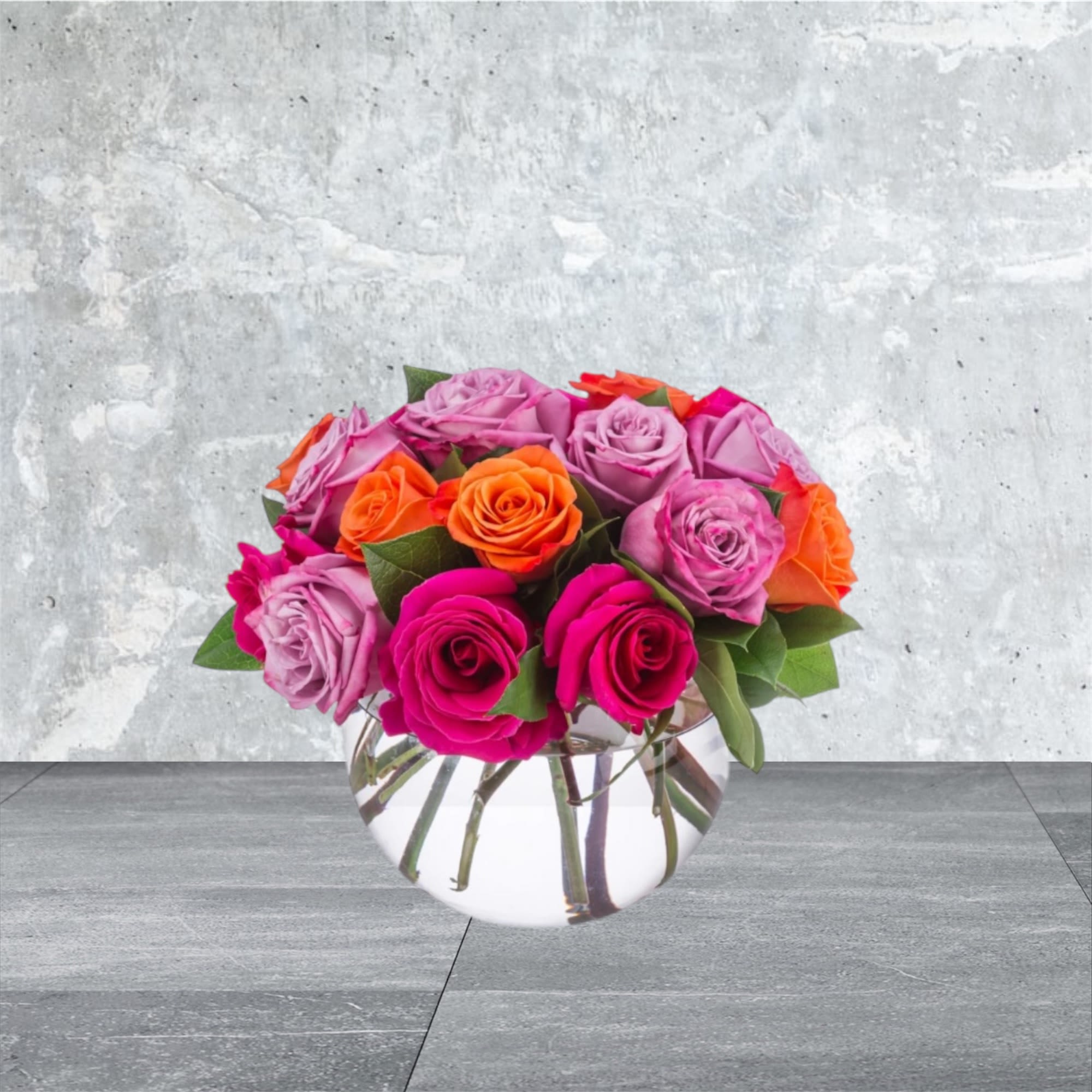 Daybreak - A lovely bowl of colorful roses brightens and lifts any room (and relationship!) A great gift for sending on Valentine's Day to your significant other, your friend, or even your mom!  Approximate Dimensions: 11''D x 11''H