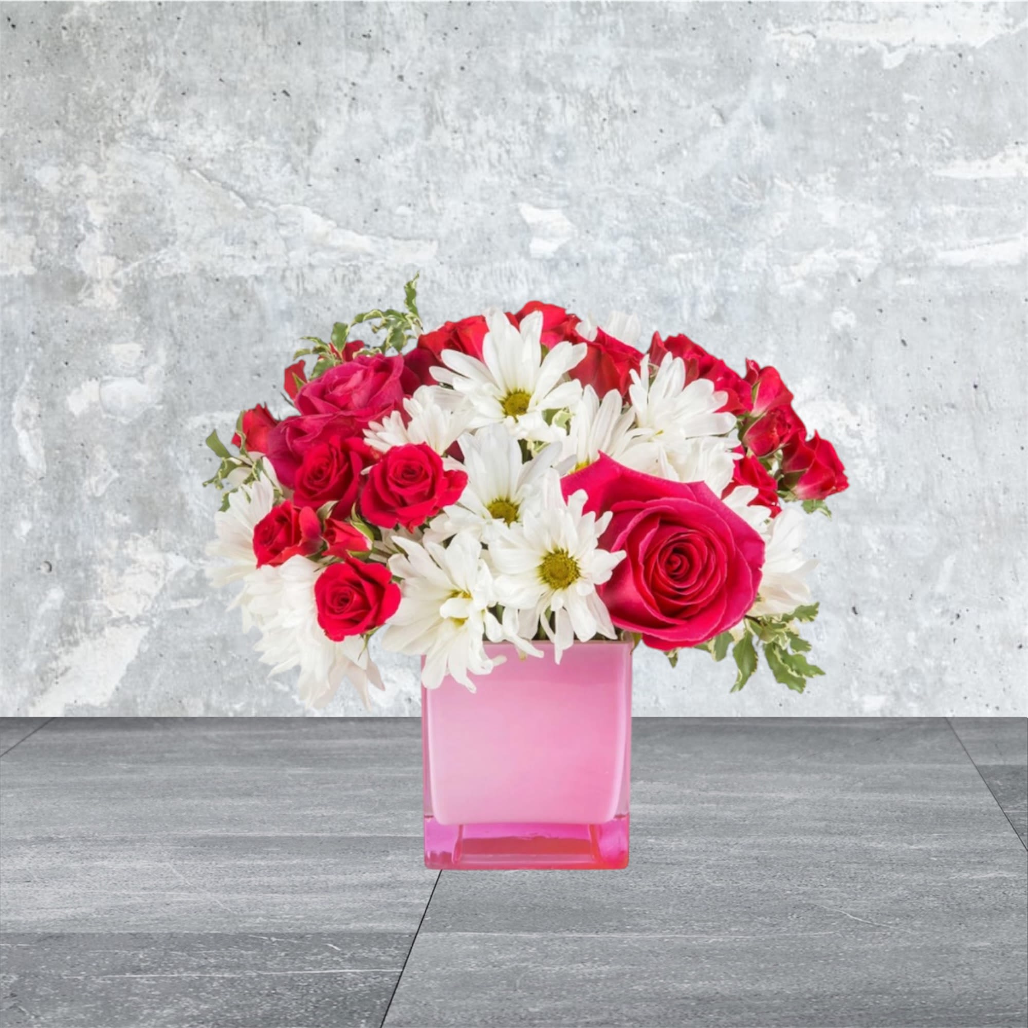 Daisy Me Rollin' - This arrangement contains spray daisies and spray roses. This is a great birthday gift. APPROXIMATE DIMENSIONS: 9&quot;L X 9&quot;W x 9&quot;H