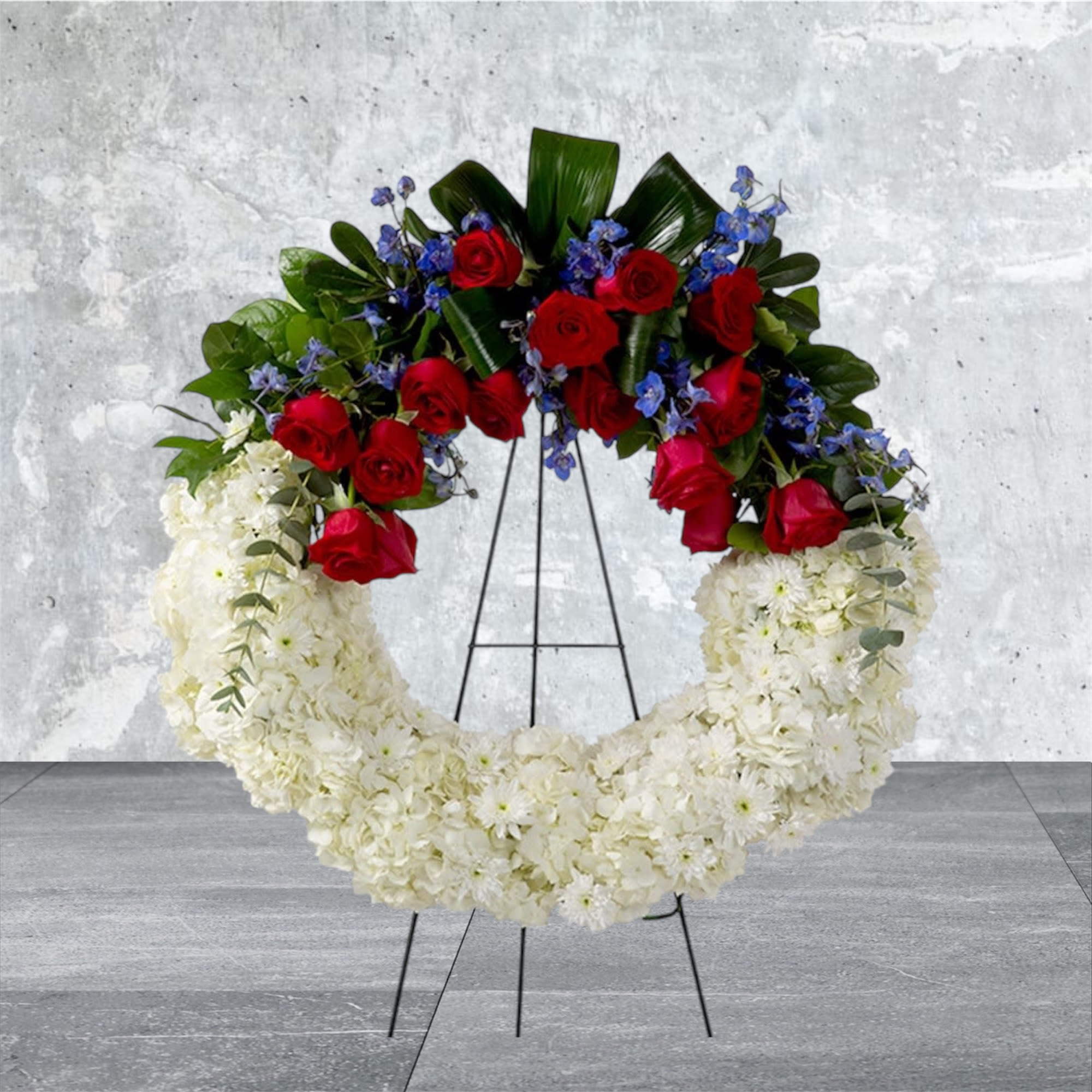 American Soul - A perfect way to honor their beliefs and actions, this red, white, and blue wreath is a tribute to those who loved their country. 