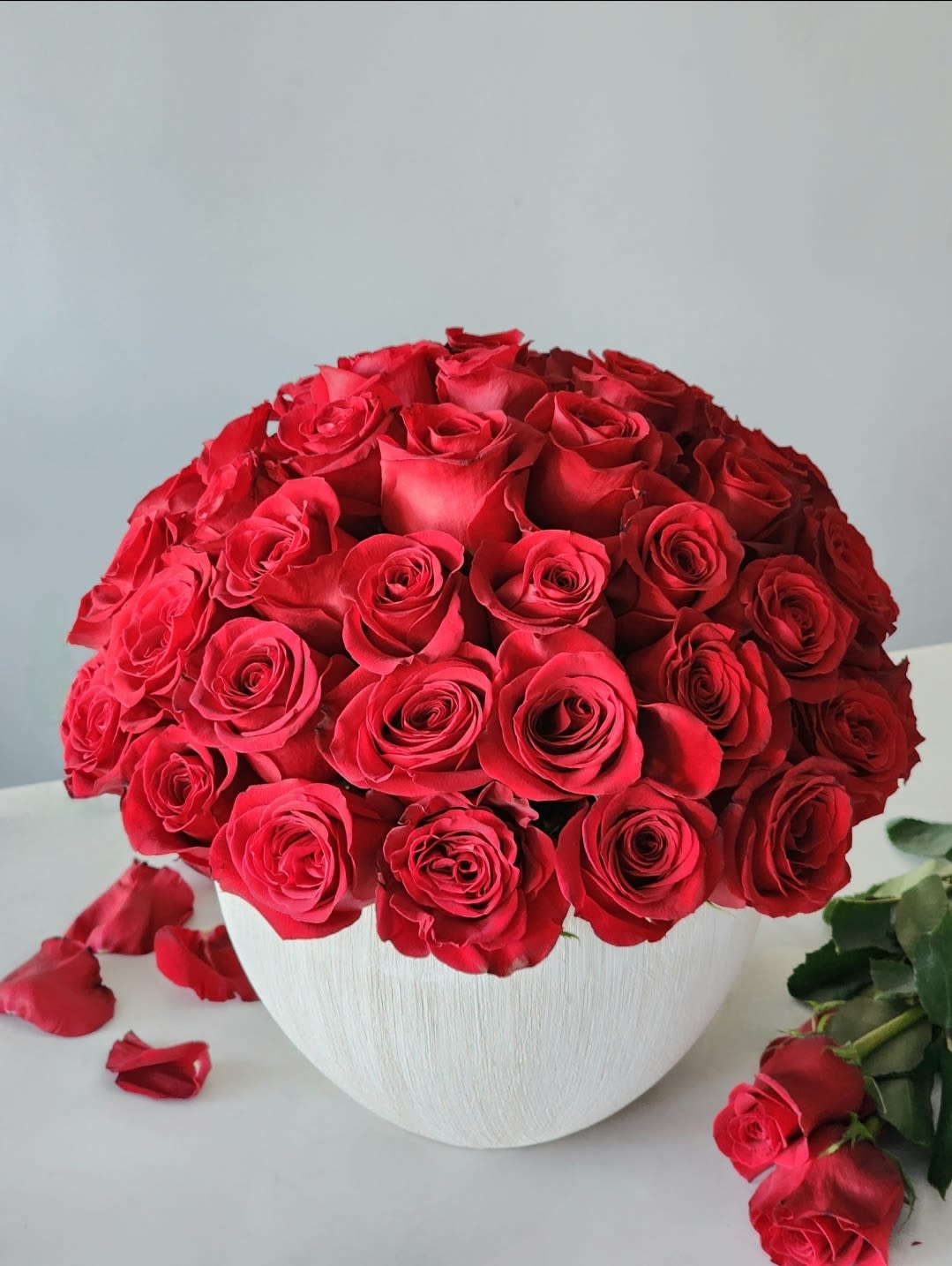 Love Me Tender  - Red roses are the embodiment of love and spiritual attraction, given to a loved one roses will find their way into their heart and bring happiness and joy there. 