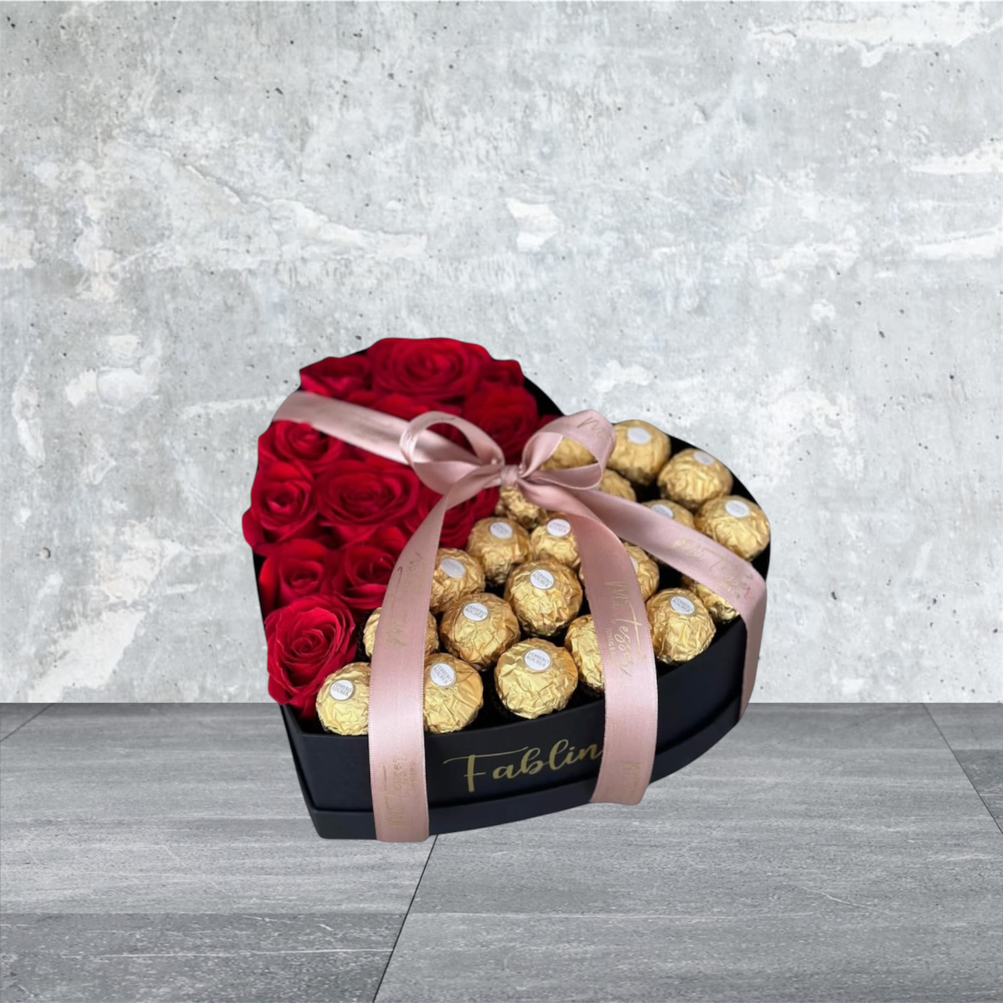 Sweetheart Box - Surprise your Valentine with the ultimate expression of love and our &quot;Sweetheart Box&quot; is a heart-shaped masterpiece that’s half romance and half indulgence! This elegant gift includes:  ️ Half lush roses – a vibrant display of timeless beauty and affection  Half decadent chocolates – a deliciously sweet way to melt their heart  This unique combination is the perfect way to say, &quot;Will you be my Valentine?&quot; Whether you're confessing your love or celebrating a special connection, this gift is sure to leave a lasting impression.  Limited availability make their Valentine’s Day truly unforgettable!